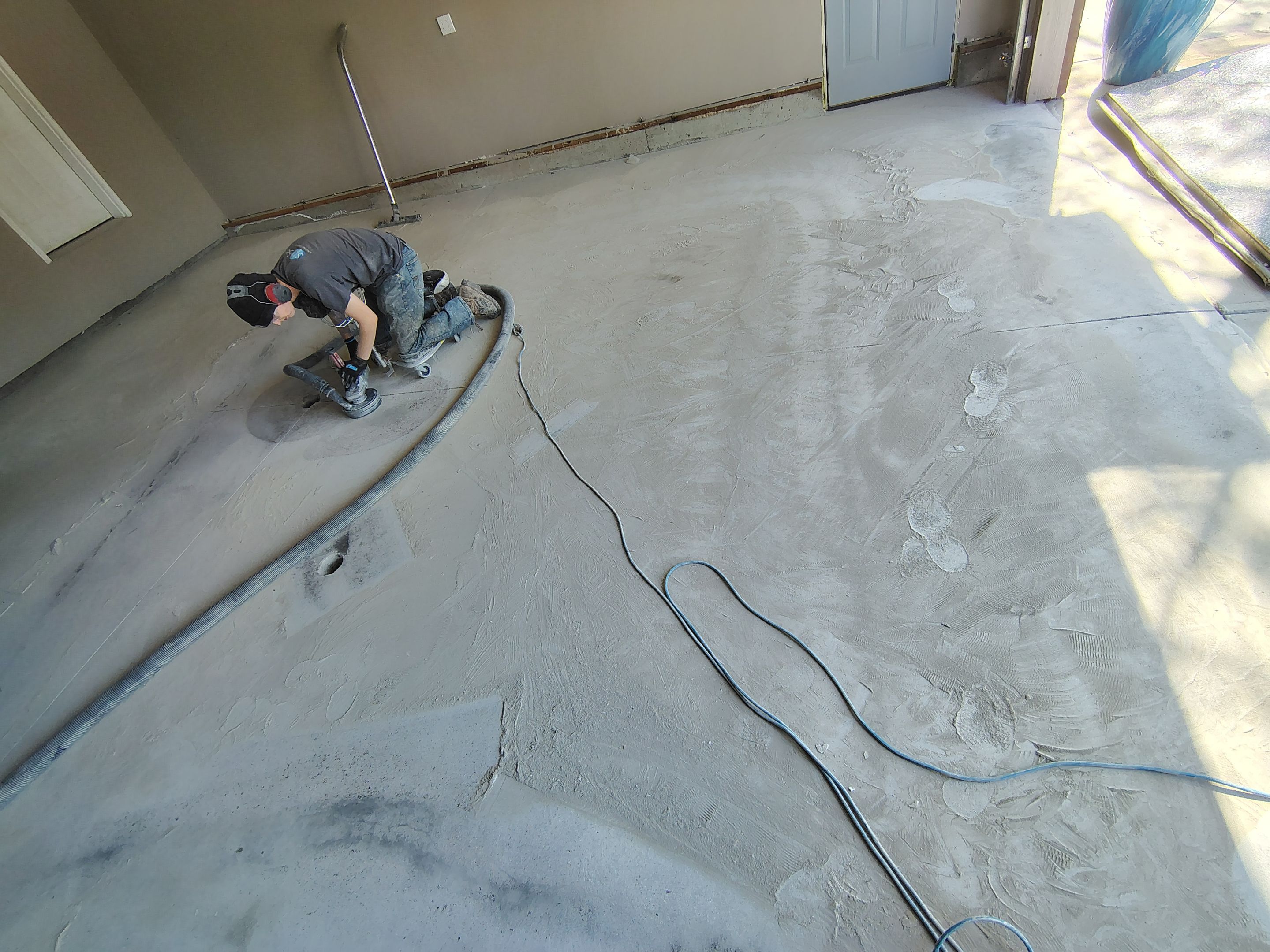 Sioux Falls Garage Concrete Repair and Epoxy Flake Floor Coating by Select Painting, Coatings & Garage Cabinets