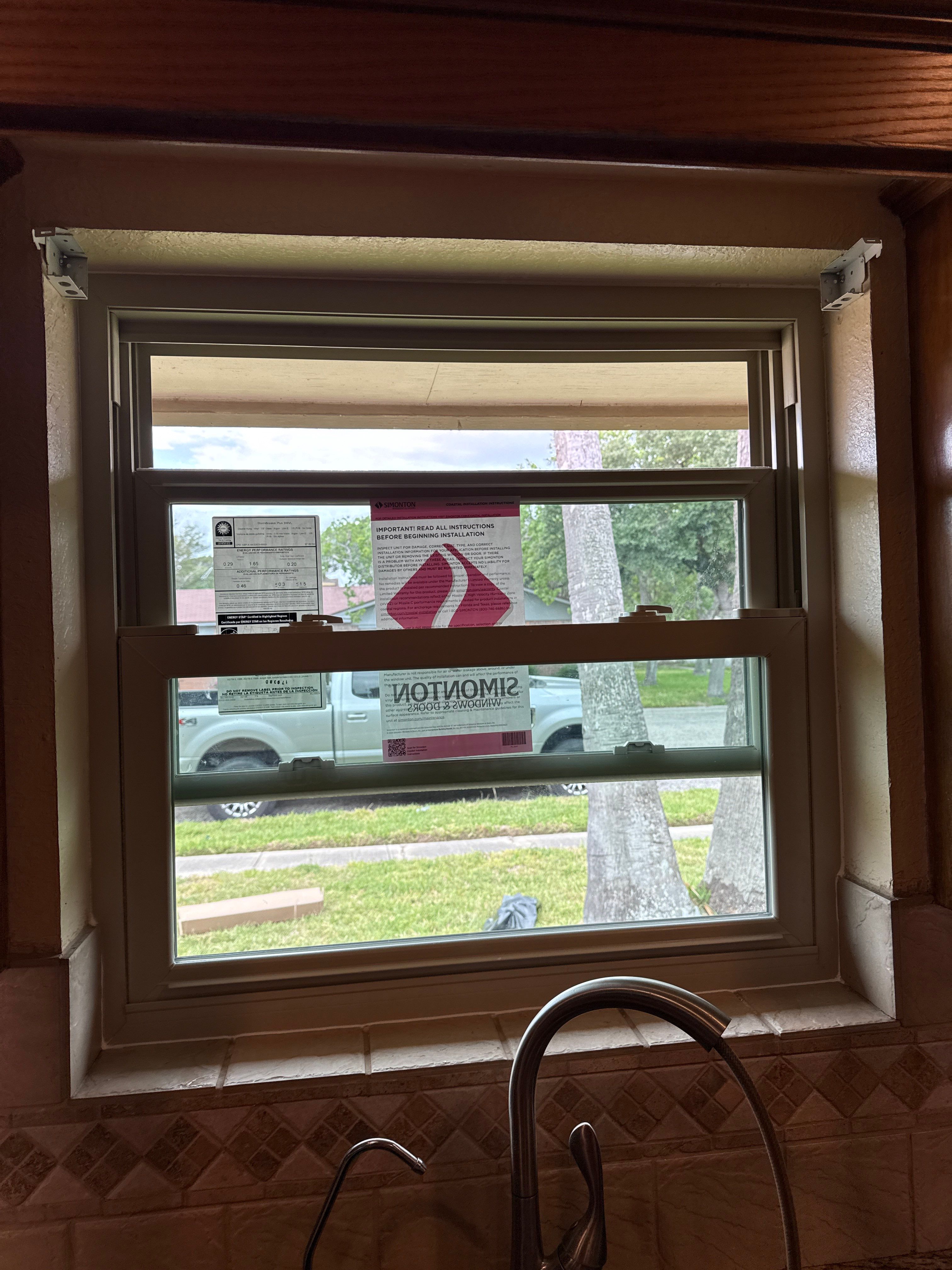 Impact windows brick install by Bayfront Roofing and Construction