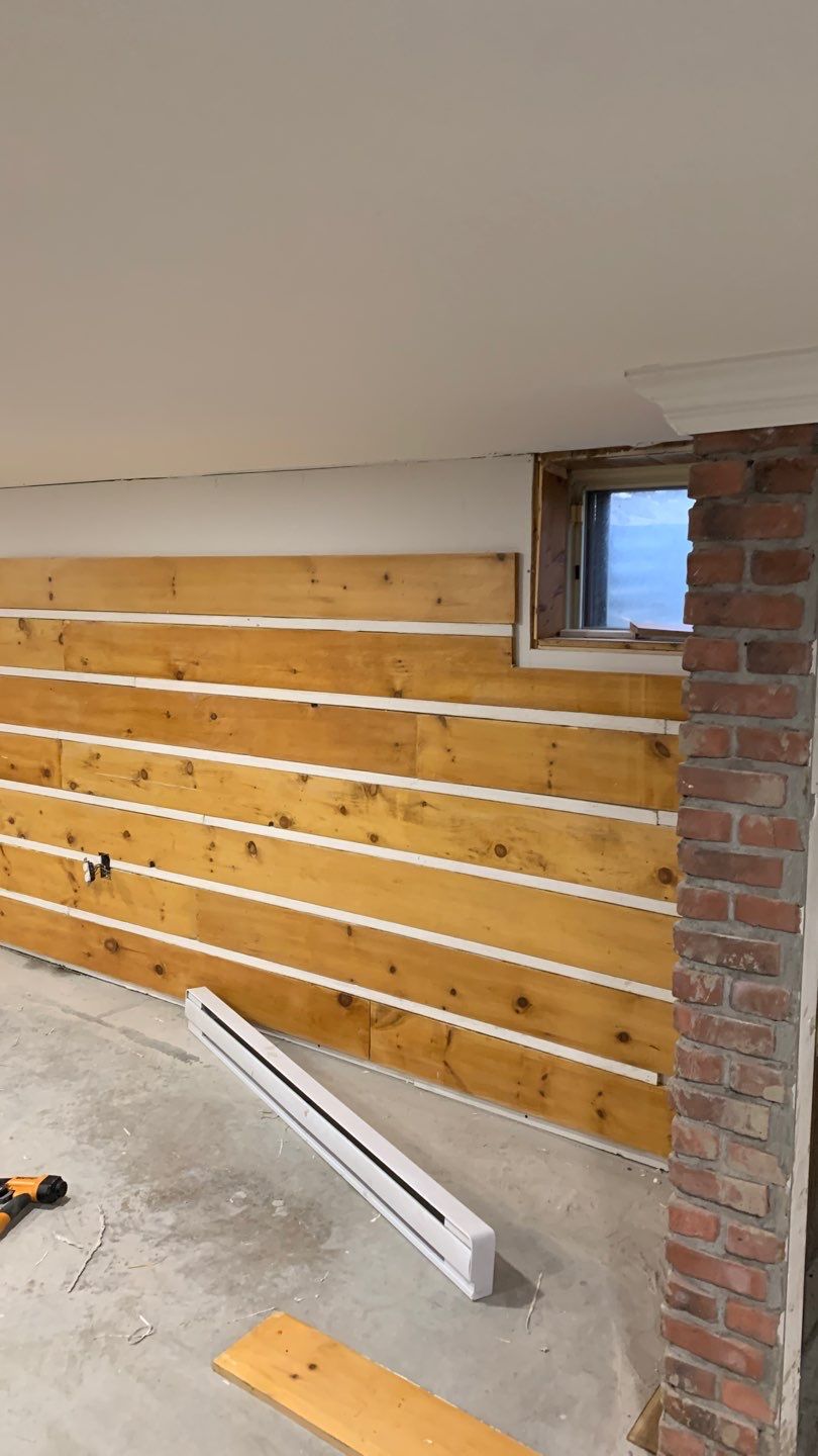 Basement finishing after flood by Eco-Nature Construction Inc.