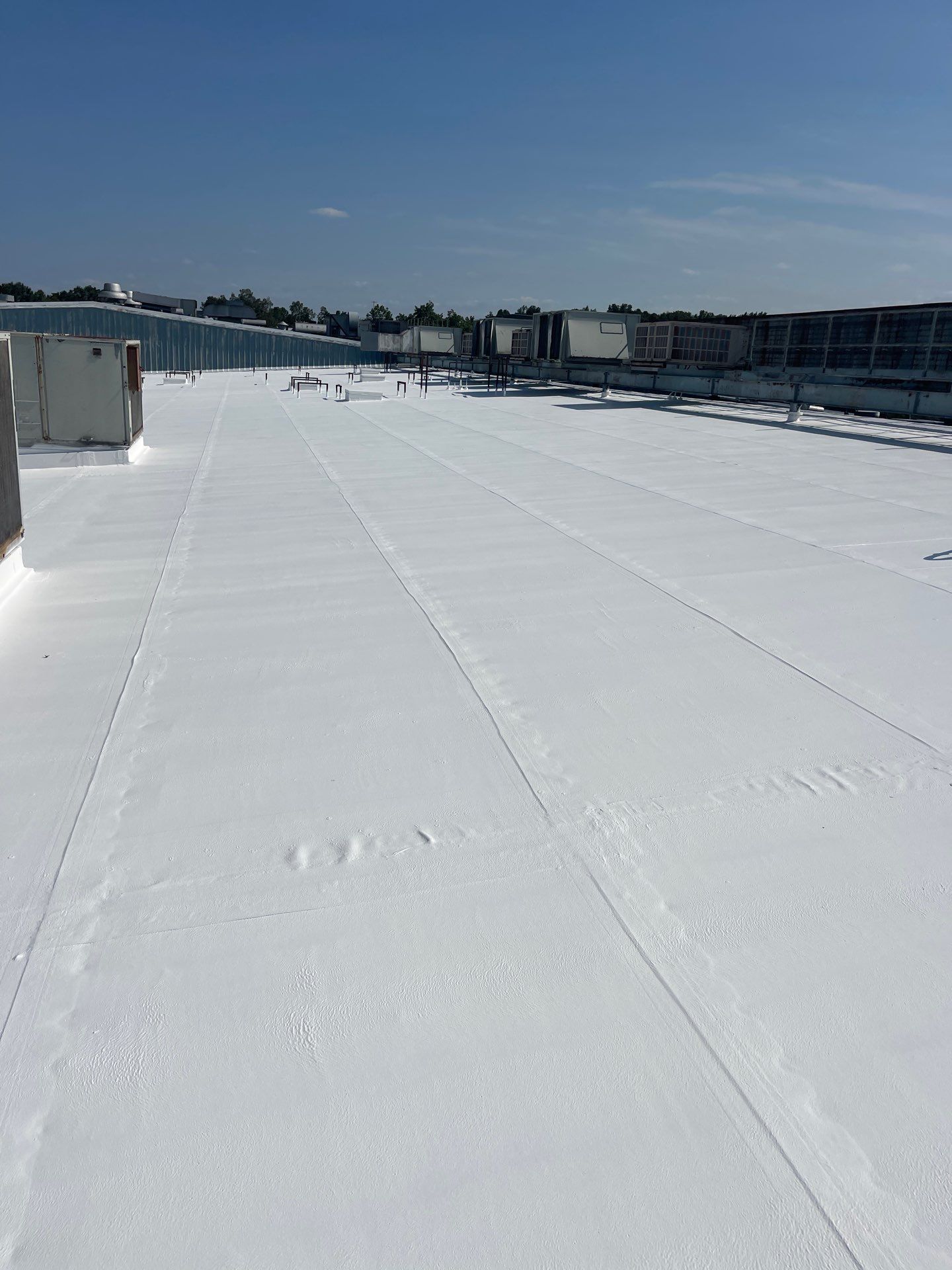 Commercial Roofing Installation using Coatings by Kentucky Commercial Roofing