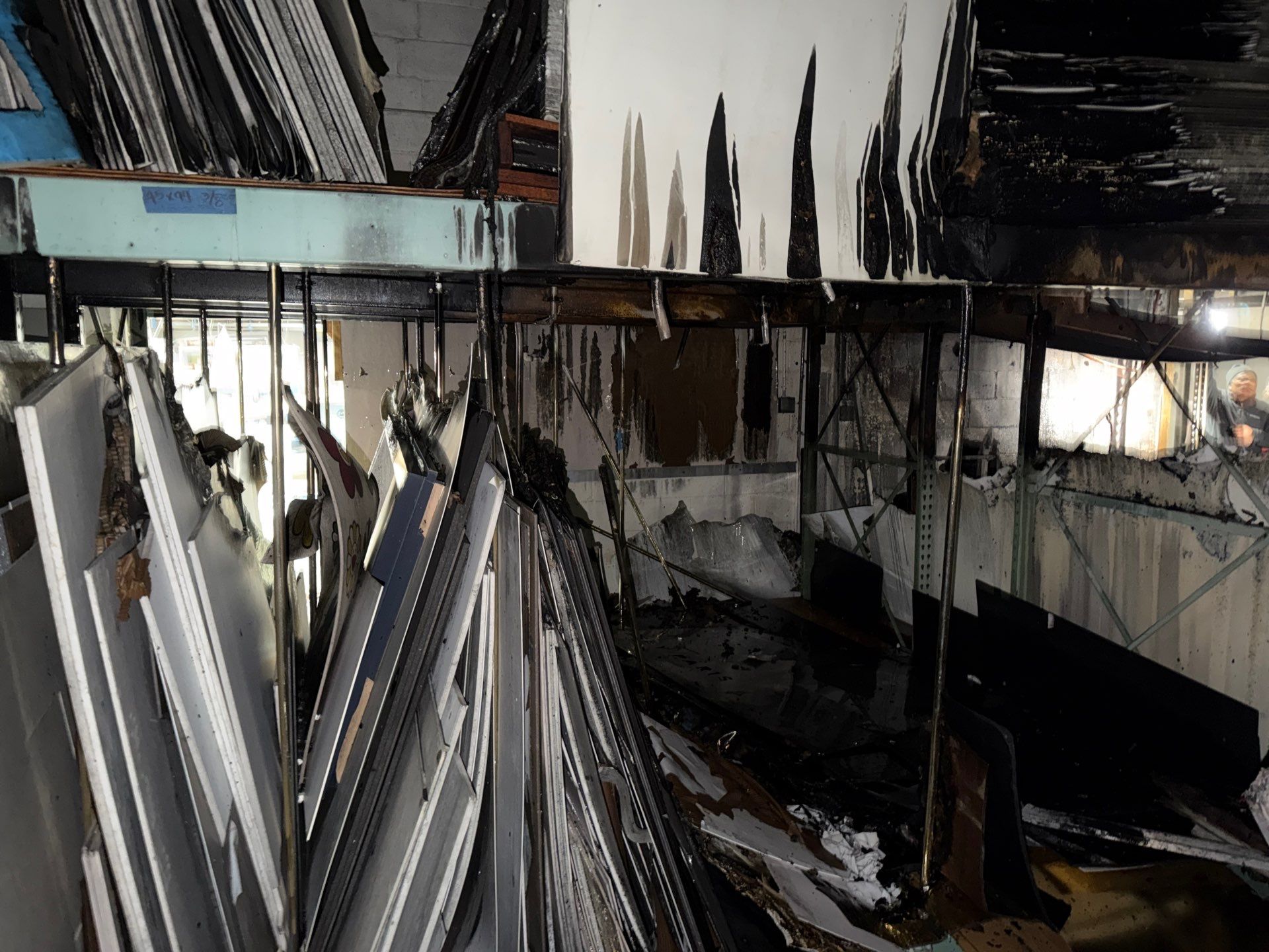 Industrial Warehouse Fire Damage Cleaning and Spray Sealing in Islandia by EMS Restoration Corp