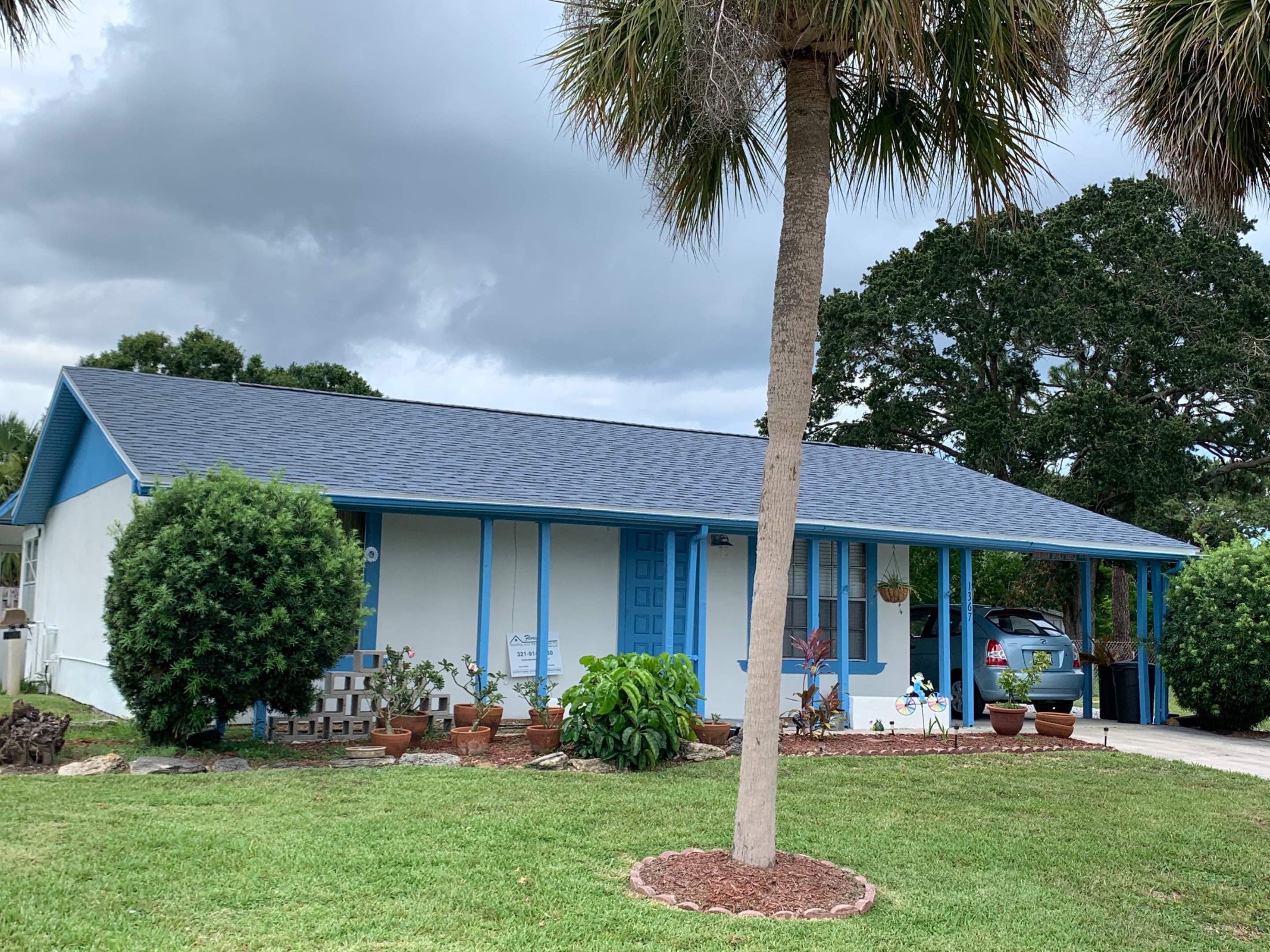 New Harbor Blue Asphalt Shingle Roof Installation in Palm Bay by Florida Roofing and Renovations Inc.