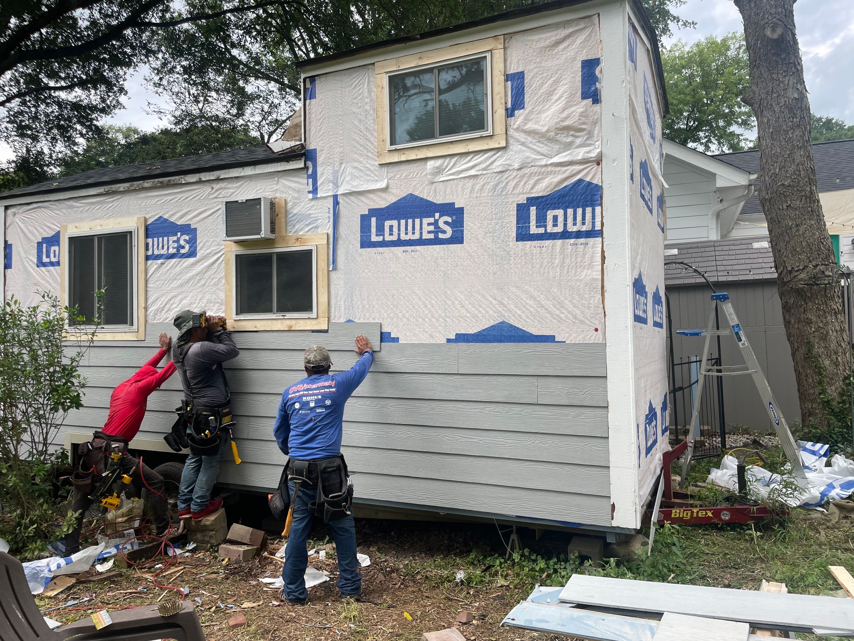 tiny home remodel- siding,paint,roofing by Nailed It Roofing & Remodeling LLC