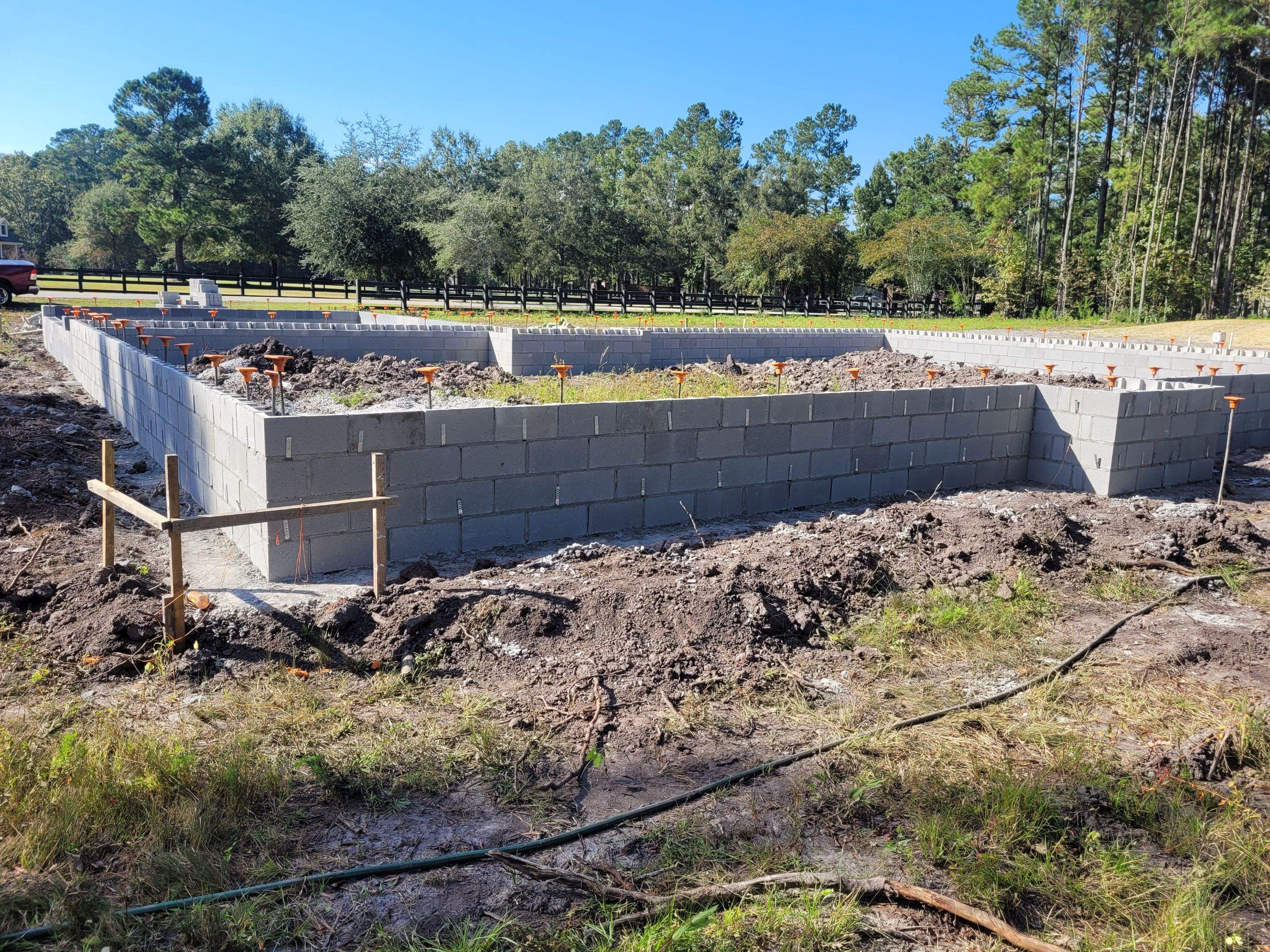New Home Construction using brick and vertical vinyl by Cornerstone Home Builders, LLC