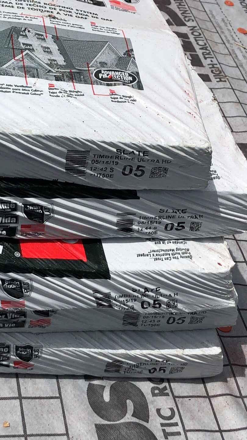 Residential Roofing Installation using Roof Replacement by American Roofing & Construction LLC