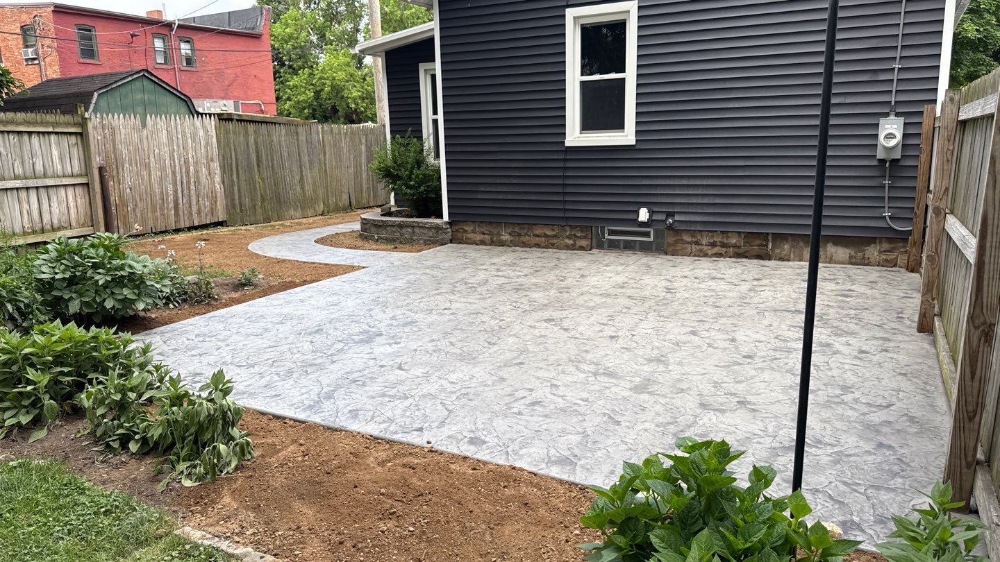 Oxford slate stamped patio and walkway  by NG Masonry & Construction LLC