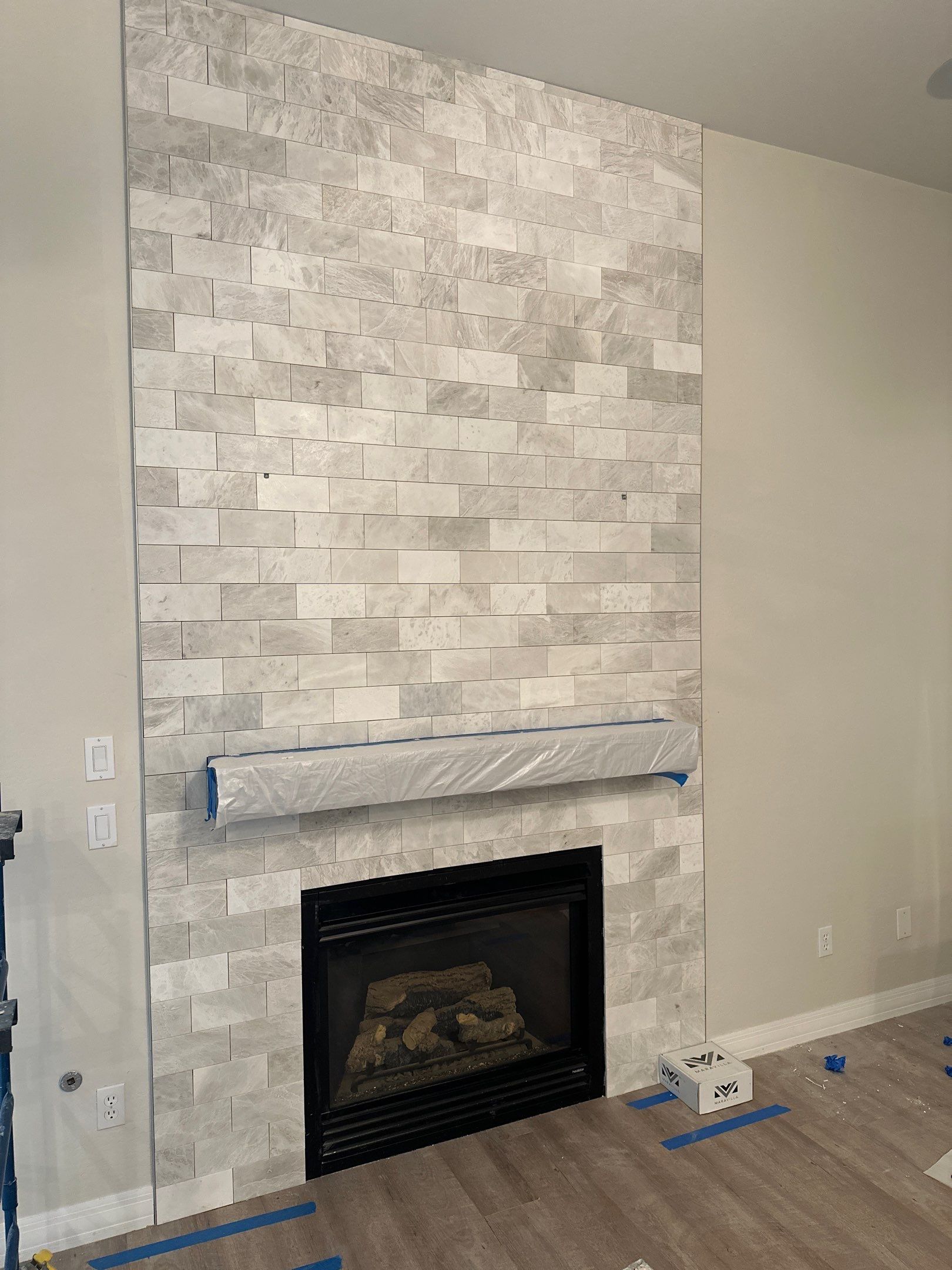 Marble Tile Fireplace by Footprints Floors of Chandler 