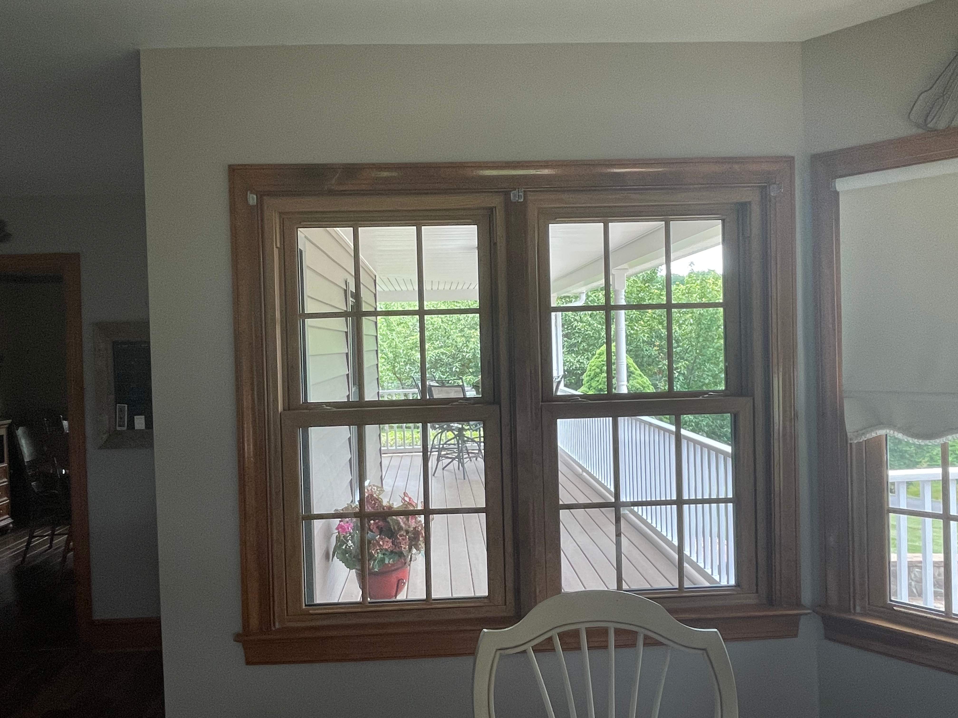 Exterior remodel including window replacement by American Home Contractors