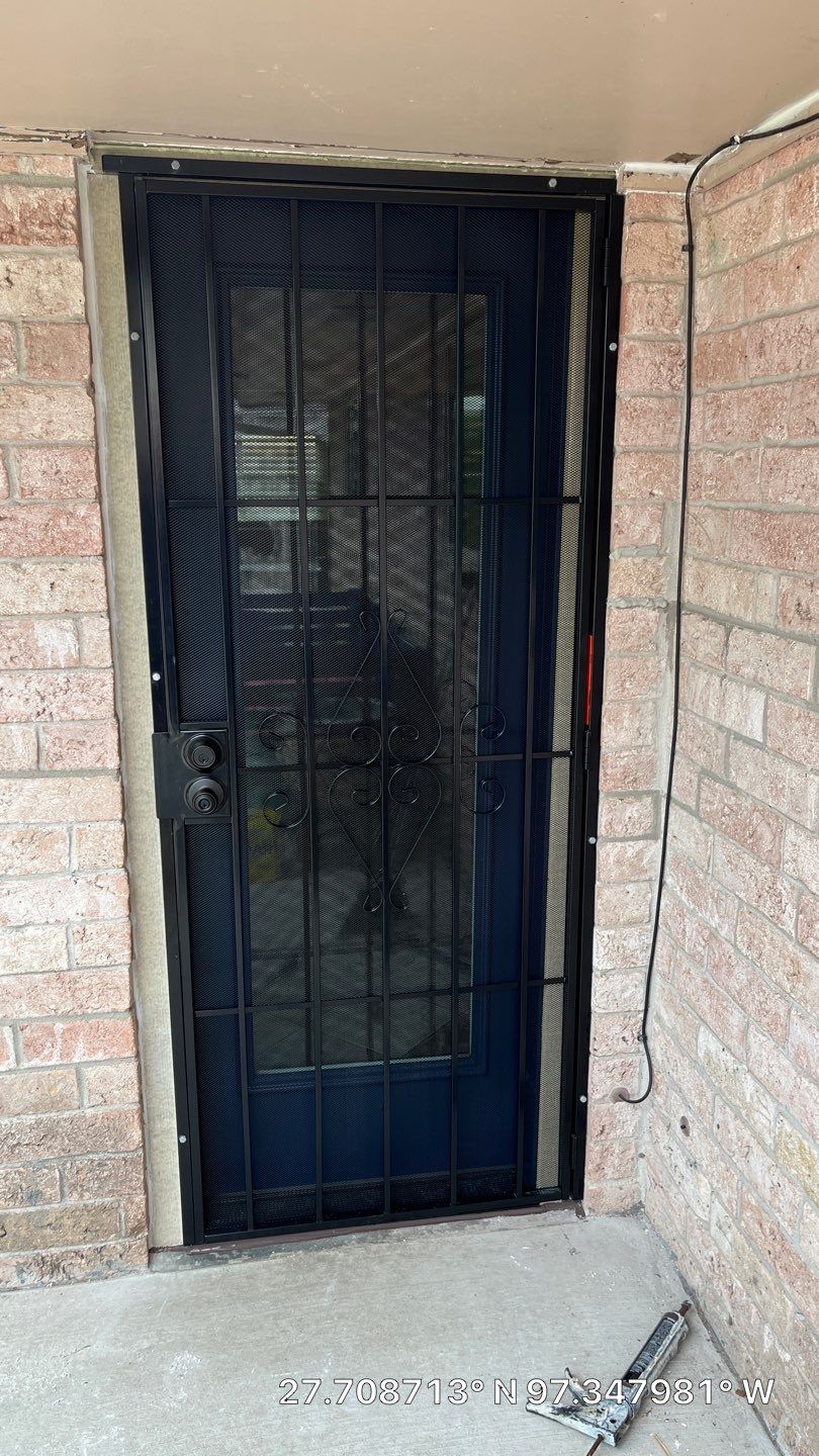 Colored Vinyl Windows to blend into brick by Bayfront Roofing and Construction