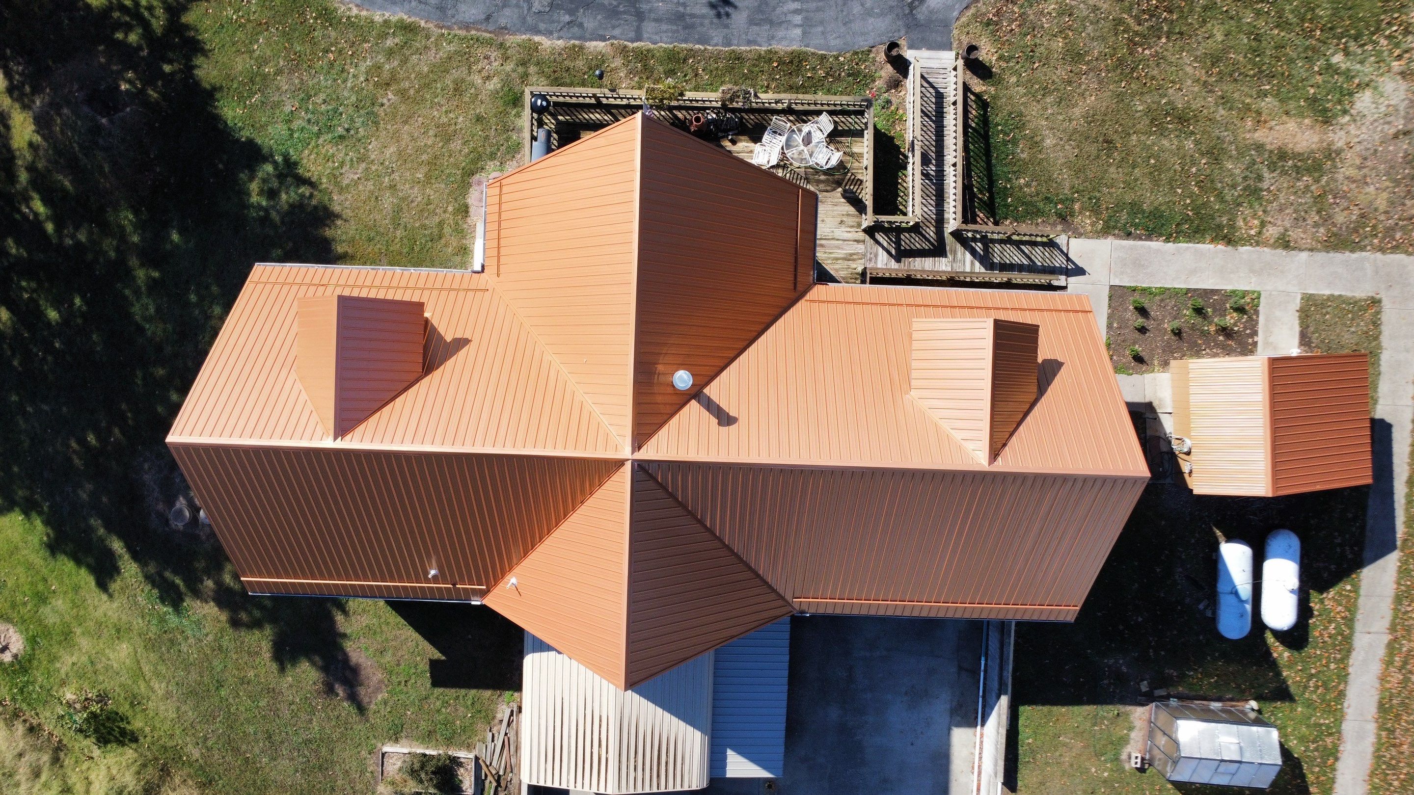 Residential Roofing & Snowguard Install - 29 Gauge G-Rib Metal - Color Copper Metallic  by Titan Commercial & Residential Roofing 