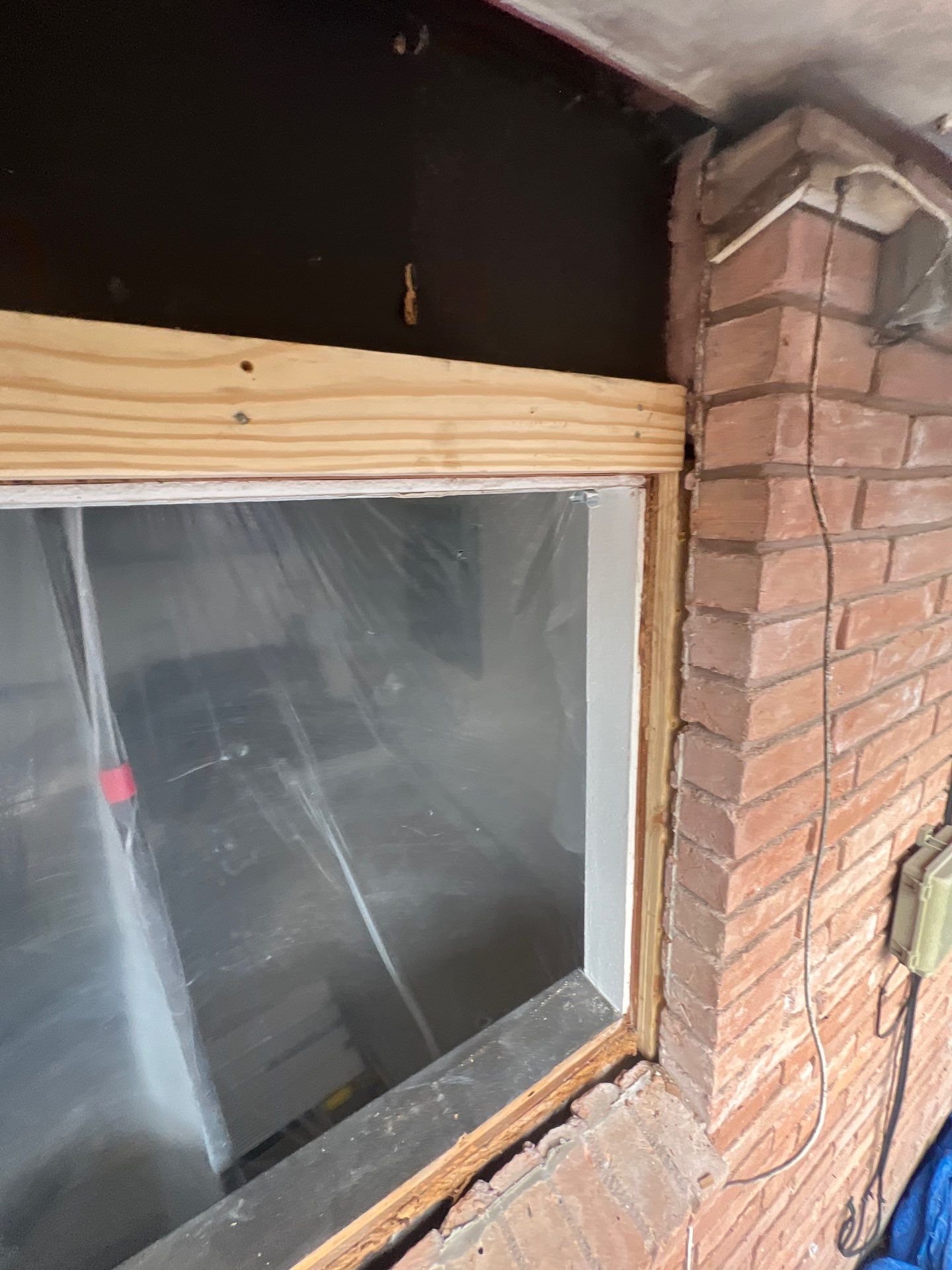 Windows in Brick with a Bay Window by Bayfront Roofing and Construction