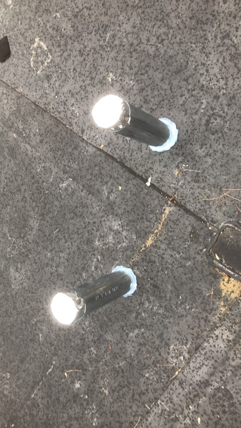 Commercial Roofing Installation using EPDM with white gutters by A Plus Exterior