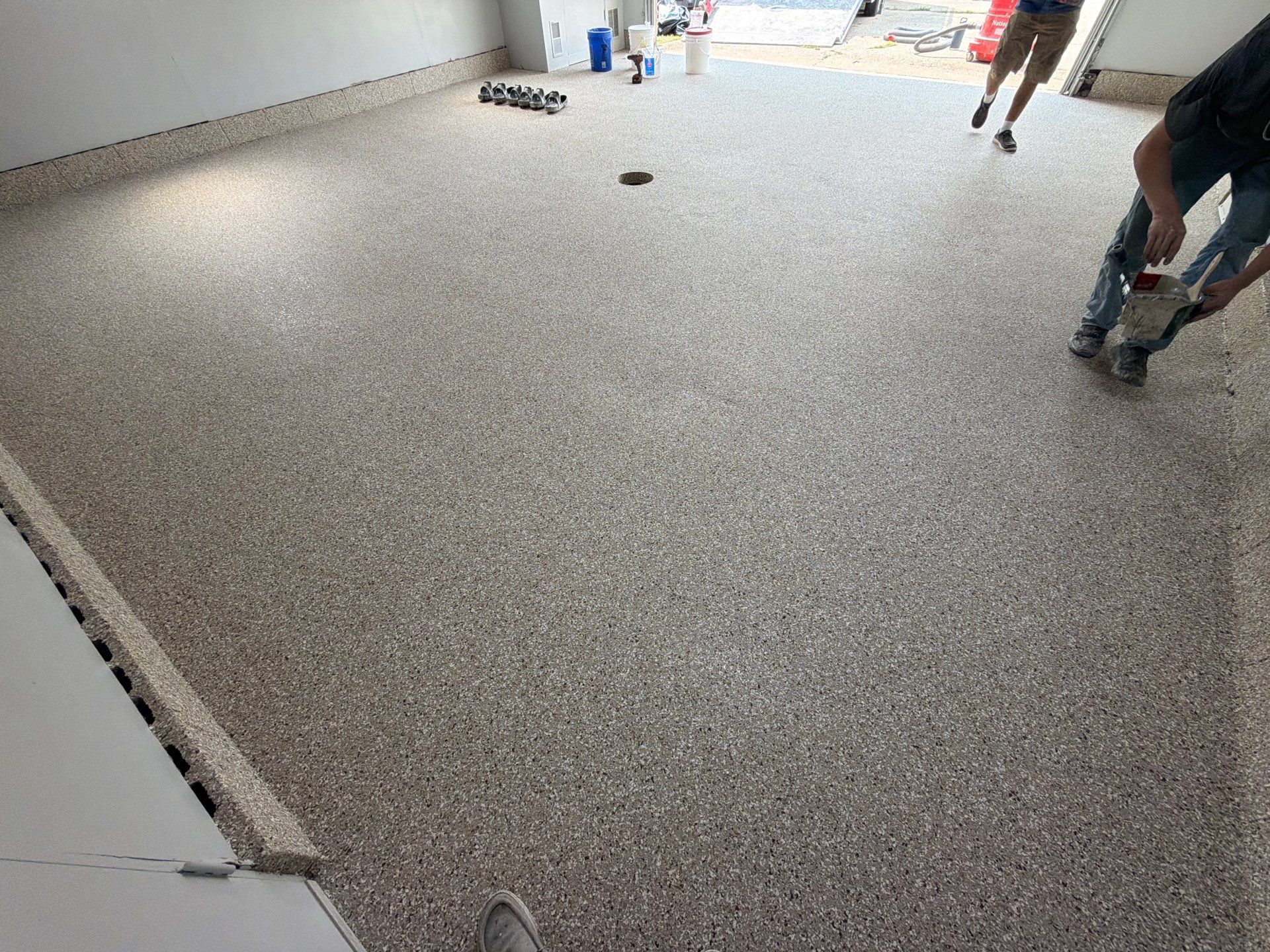 Garage Epoxy Flake Floor Installation and Exterior Siding Repairs in Muskegon by Gordon Painting