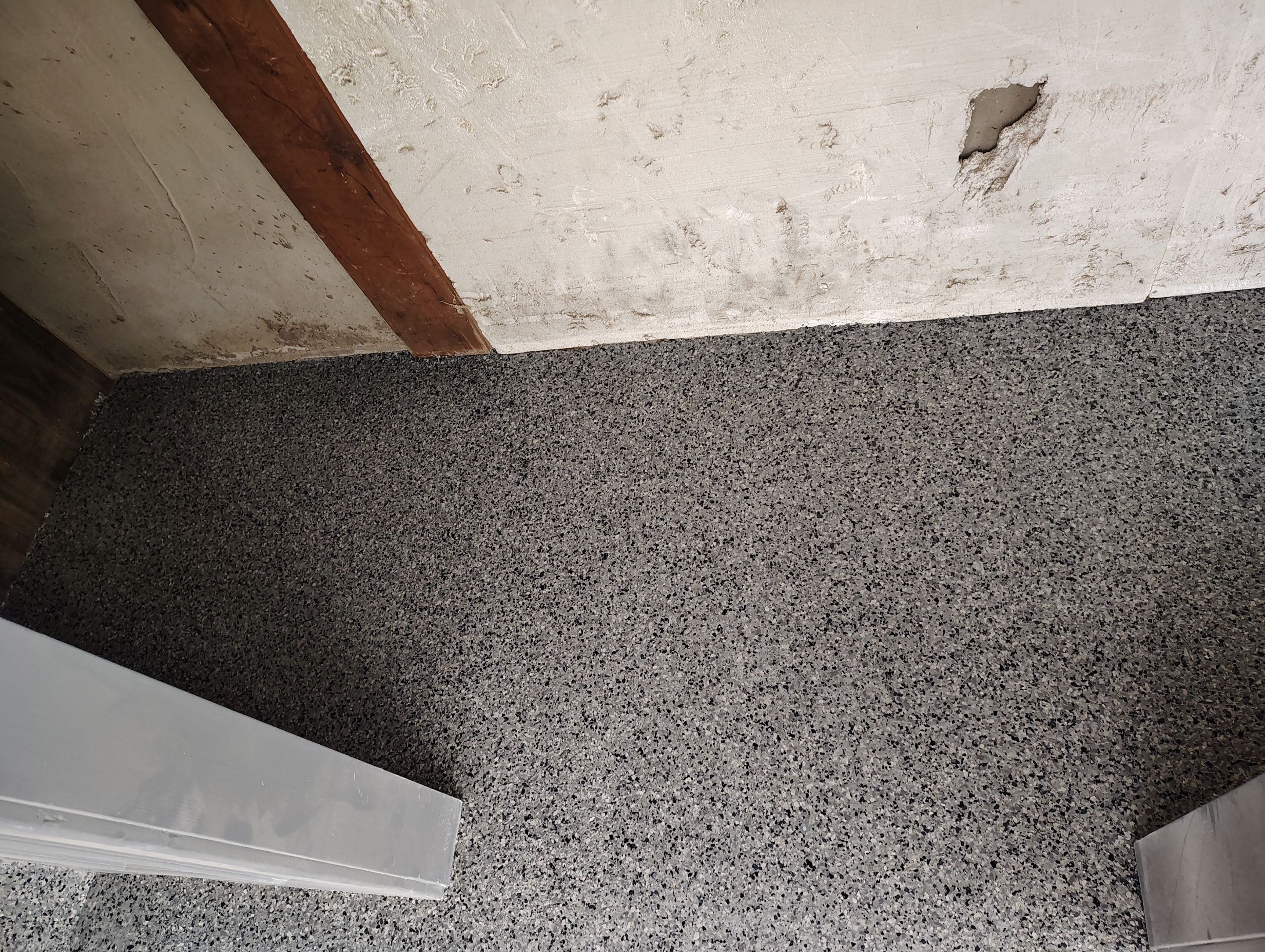 Nightfall Decorative Chip Garage Floor Coating in Luverne, Minnesota by Select Painting, Coatings & Garage Cabinets