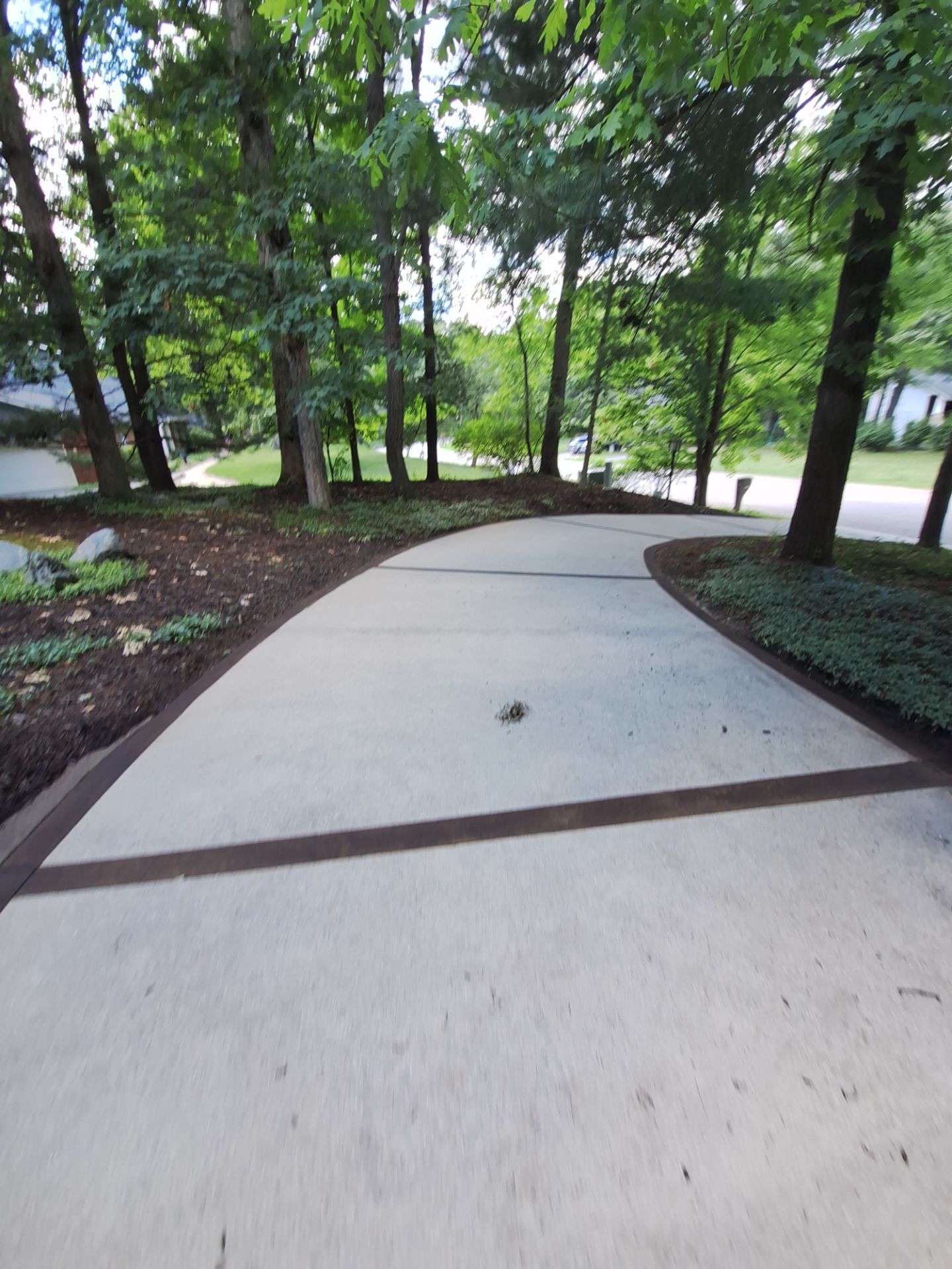 Concrete Driveway and Walkway Staining With Espresso Borders in Grand Rapids by Gordon Painting
