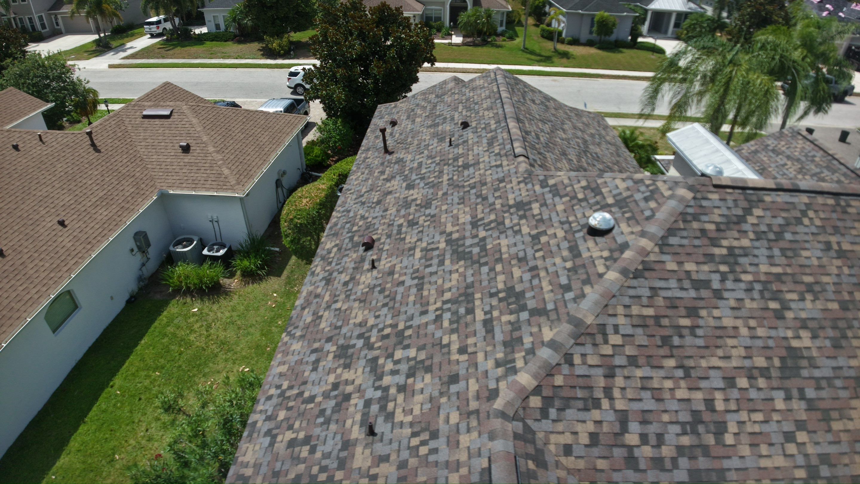 Architectural Summer Harvest Asphalt Shingle Roof Replacement in Bradenton, Florida by Trinity Restoration and Roofing LLC