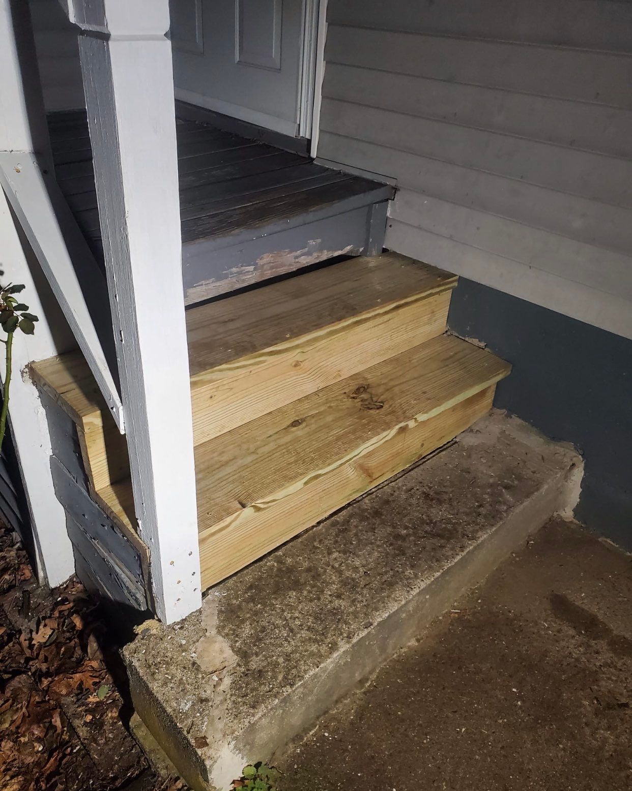 Deck Installation using Pressure treated railing by A Plus Exterior