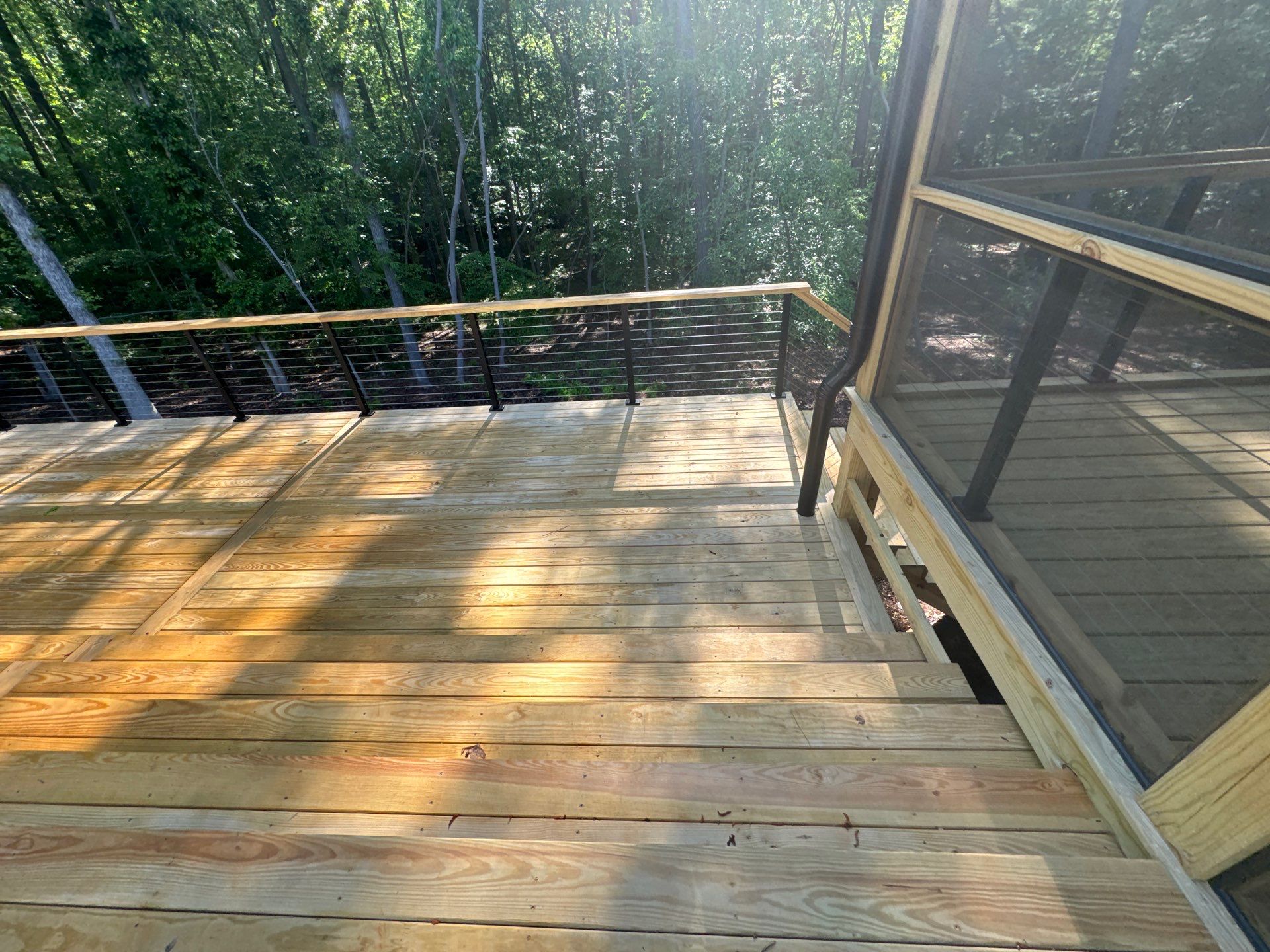 Porch and Deck staining  by GonzalezPainters & Contractors Inc 