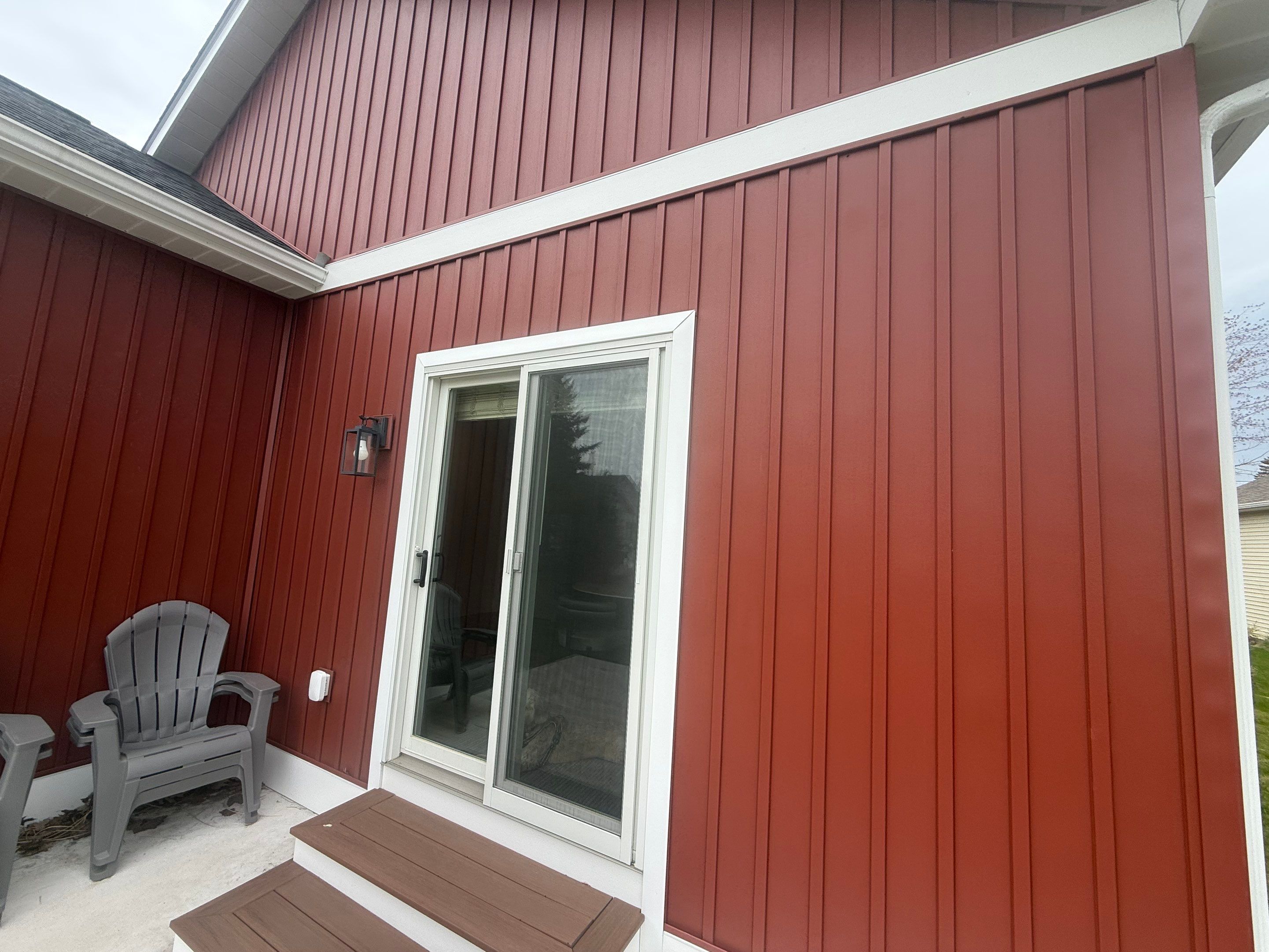 Sunesta Retractable Awning Installation for Charlevoix Patio by Rainbow Seamless Systems