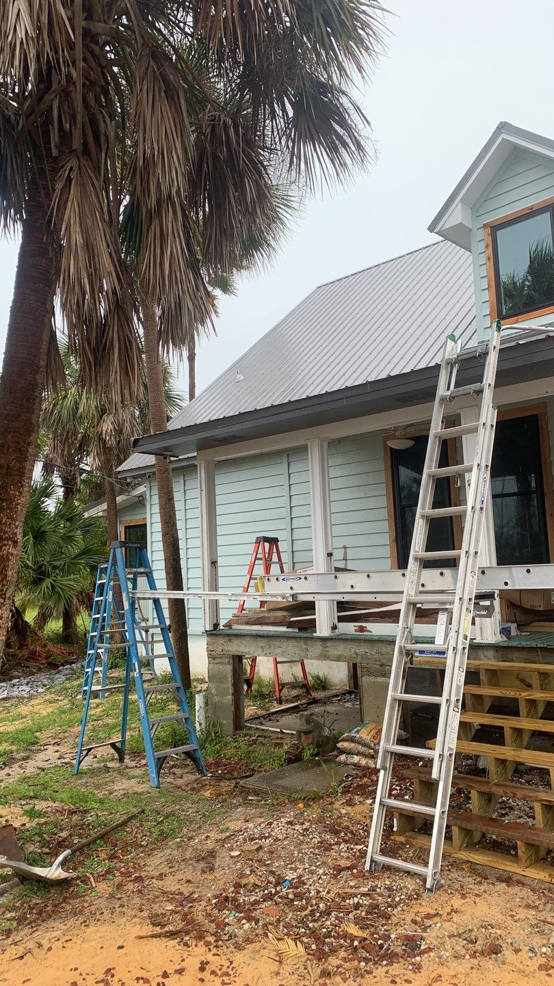 Seamless Gutter Installation using Charcoal Grey Gutters by Gutter Professors