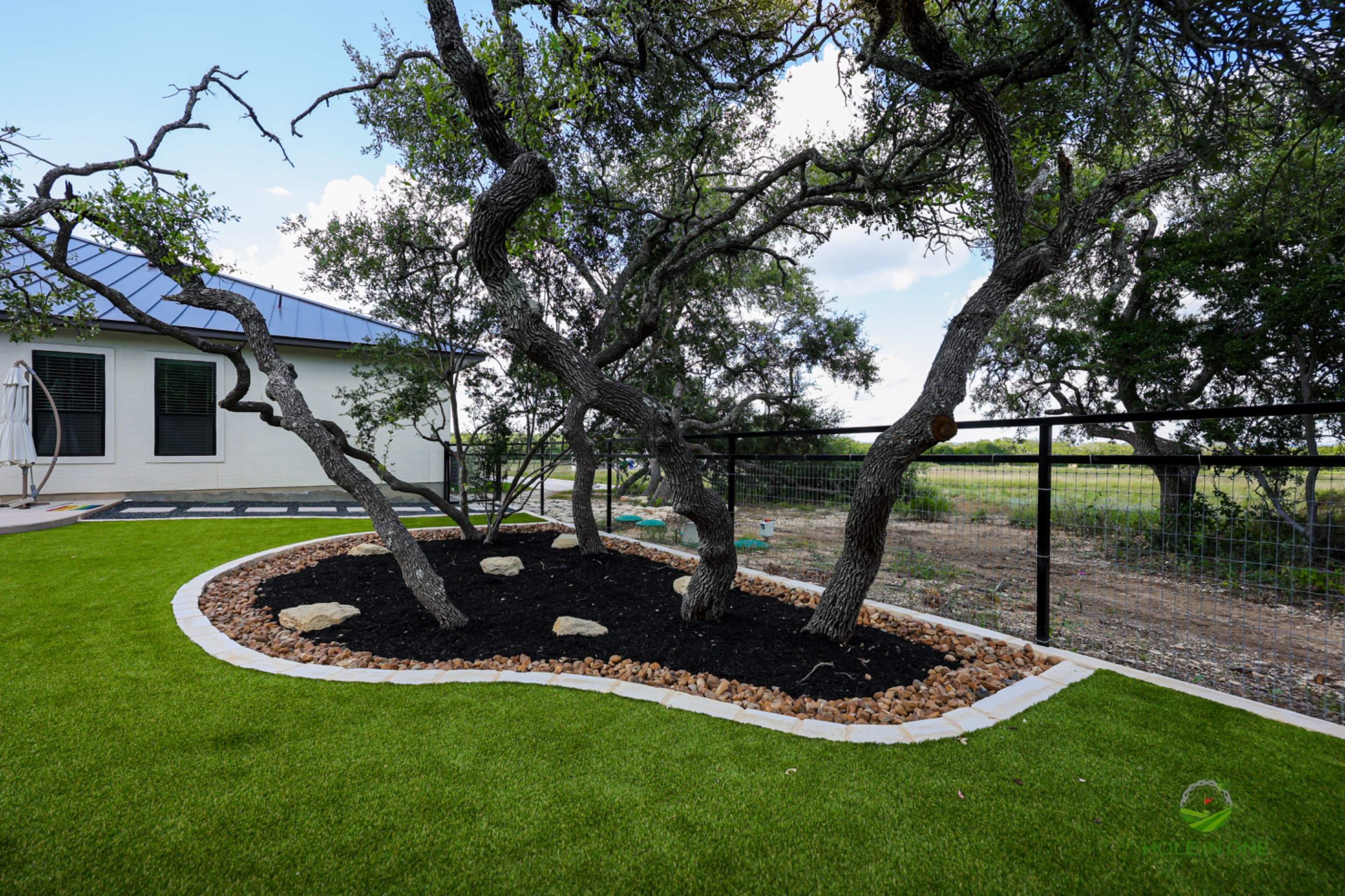 Belle Oak, Bulverde Tx. by Hole In One Lawns, LLC
