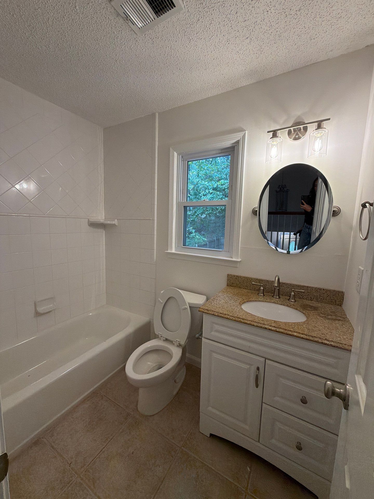 Marietta Home Renovation Featuring Custom Tiled Showers and Kitchen Updates by RENOMAXIT, LLC