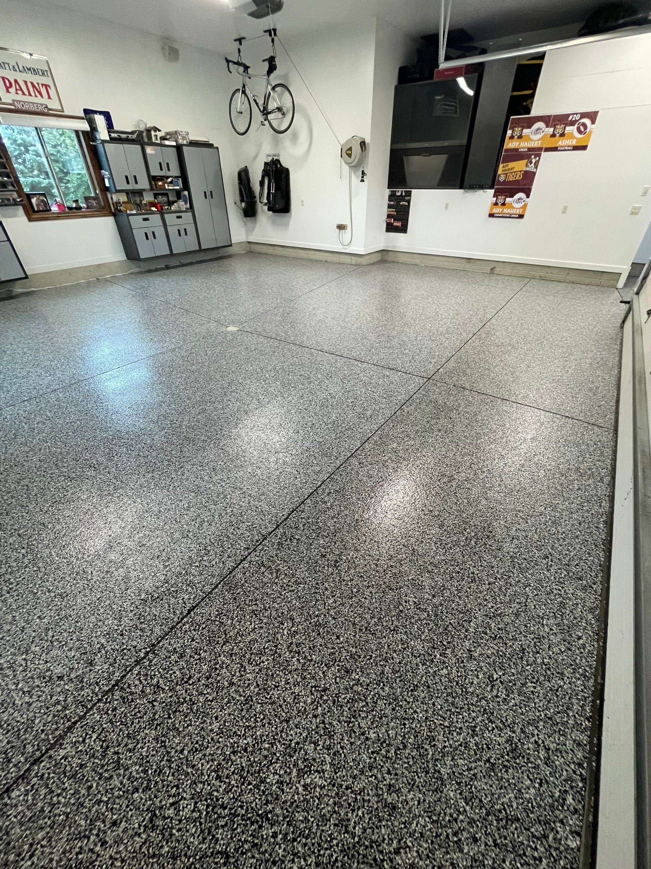 Garage Floor Coating and Domino Flake Finish in Sioux Falls by Select Painting, Coatings & Garage Cabinets