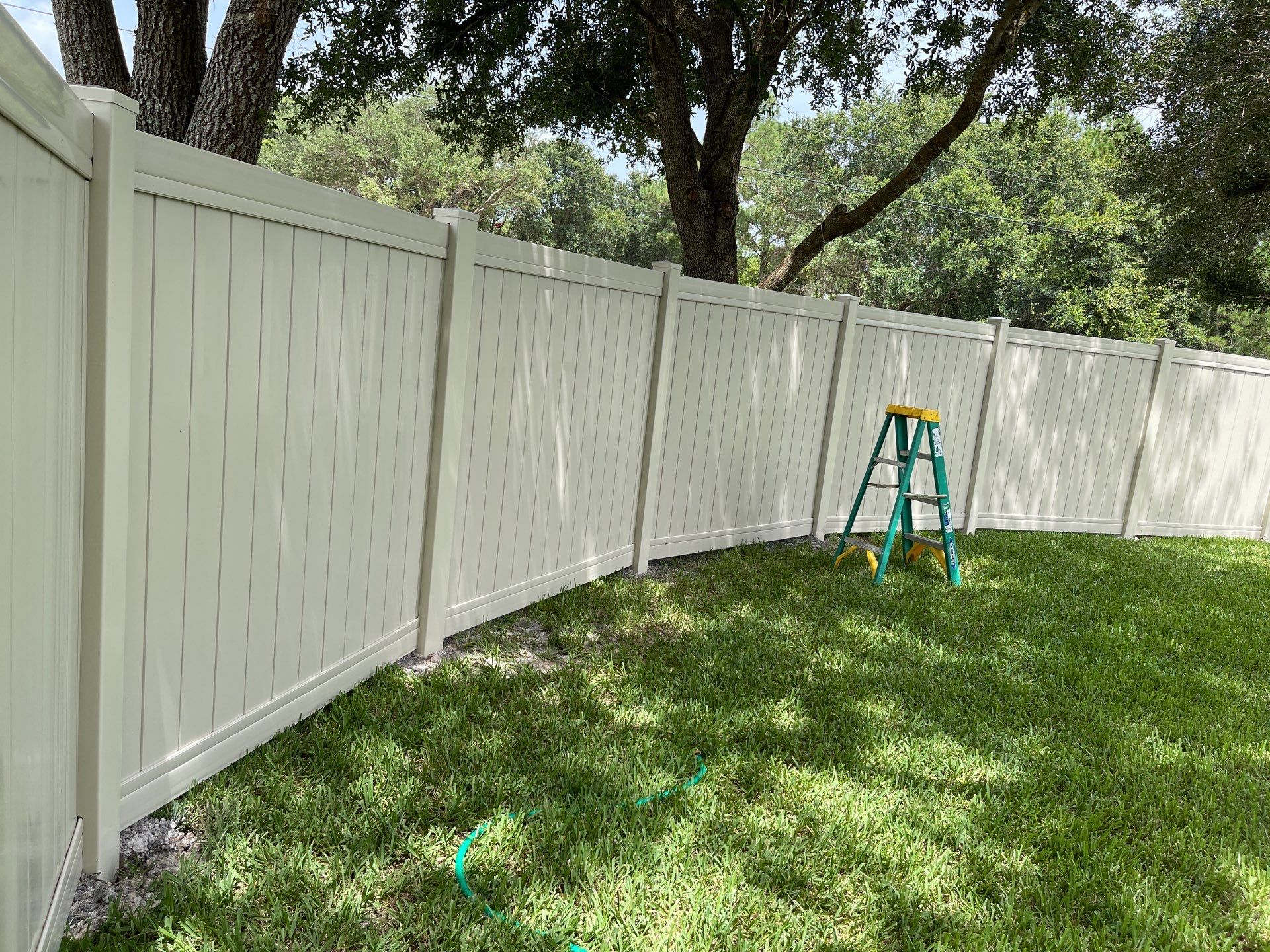 North Port, FL Tan Vinyl Privacy Fence  by Asap fence and gates, LLC