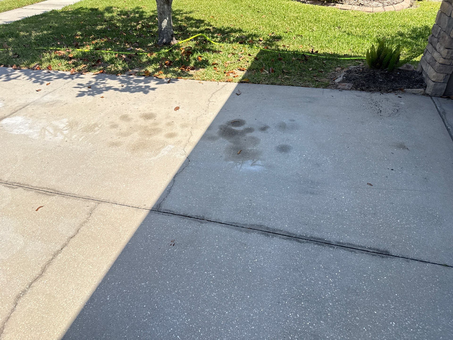 Concrete Driveway Oil Stain Removal | Harrison Ranch Community | Parrish, FL by Sunshine AquaWash
