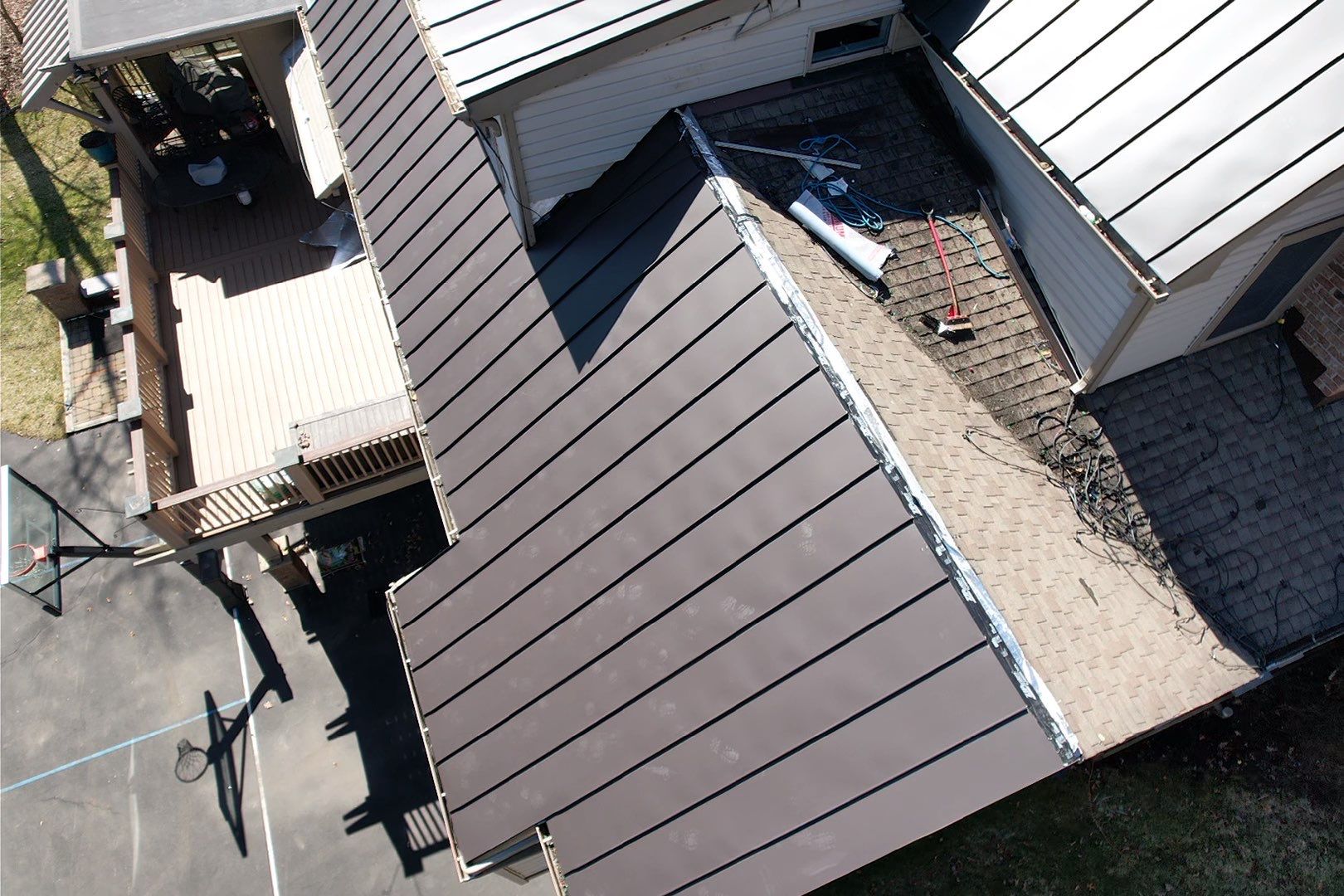 Metal Roof Replacement  by American Home Contractors