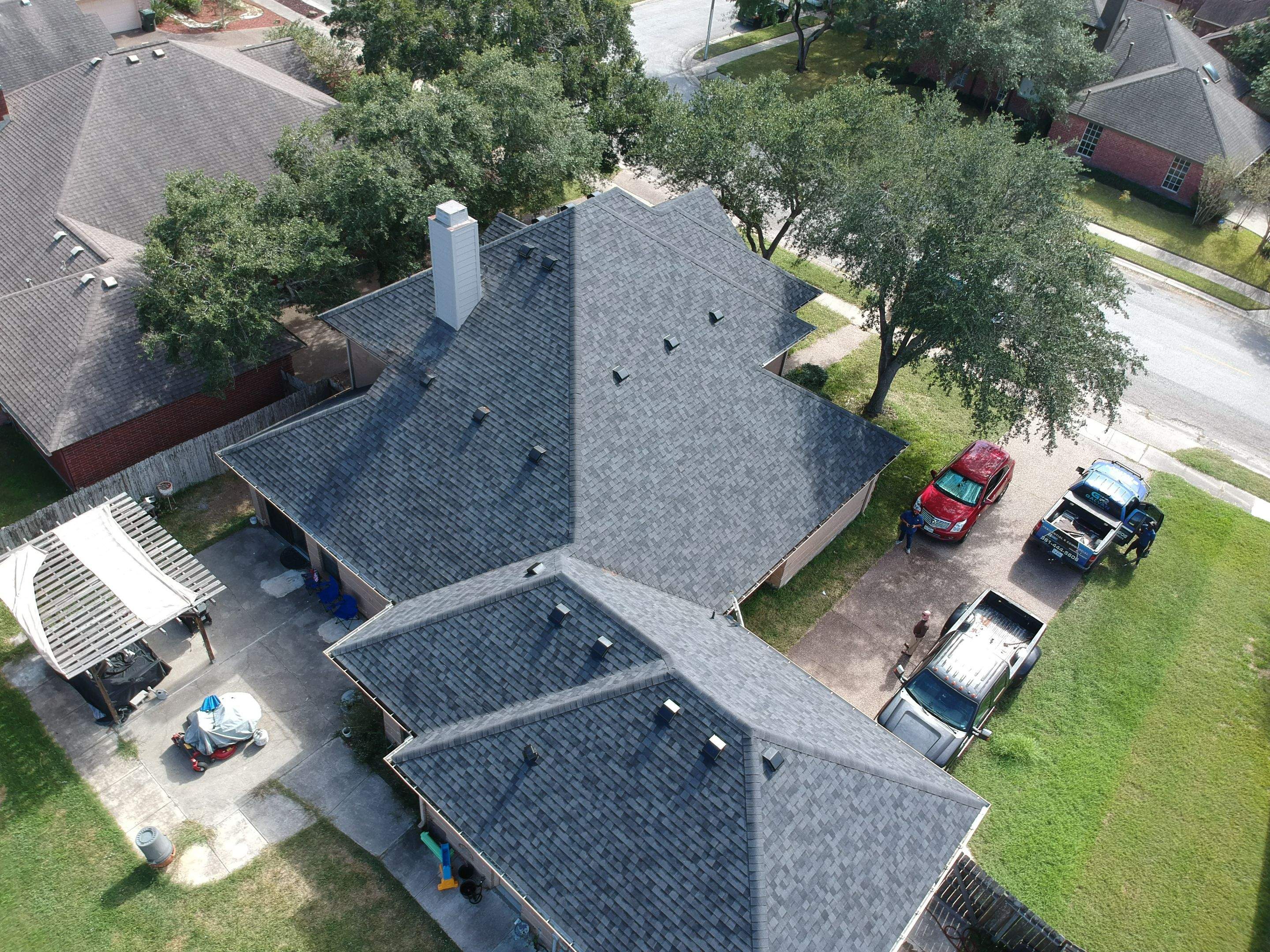 Residential Roofing Installation using Certainteed Landmark Moire Black by Galvan Roofing and Construction