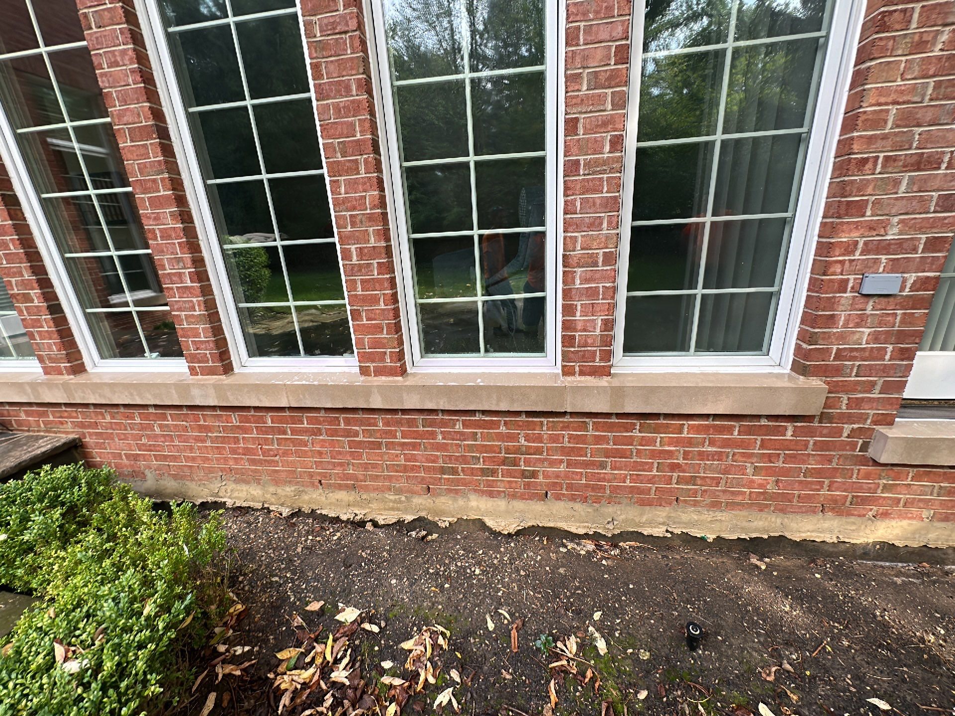 natural stone using Algaecide, soft wash soap by Northern Power Washing LLC.