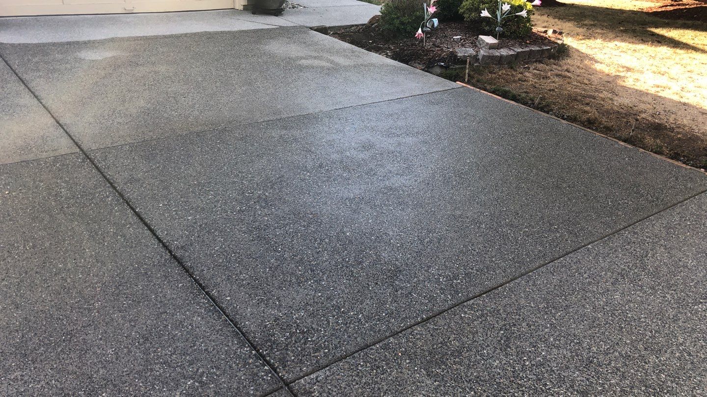 Joan | Concrete Driveway & Walkway   by Jireh Asphalt & Concrete Inc 