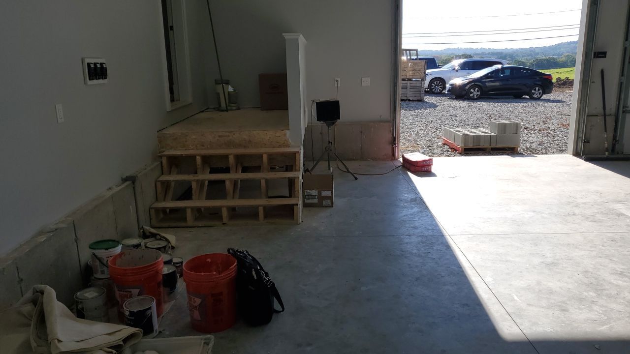 Rogers Garage TransFLOORmation by Symphony Concrete Coatings