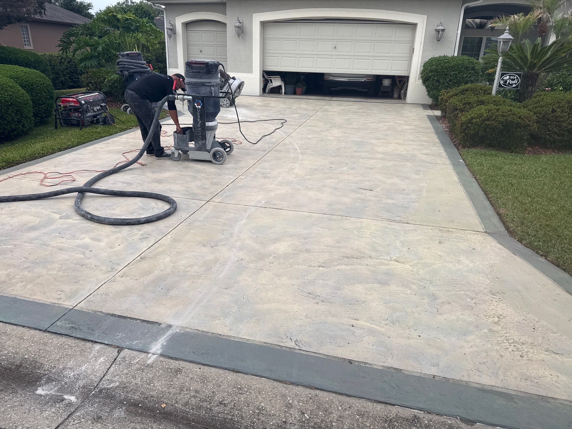 Driveway, Sidewalk & Porch in TrailMix (Torginol) by Innovative Concrete Coatings 