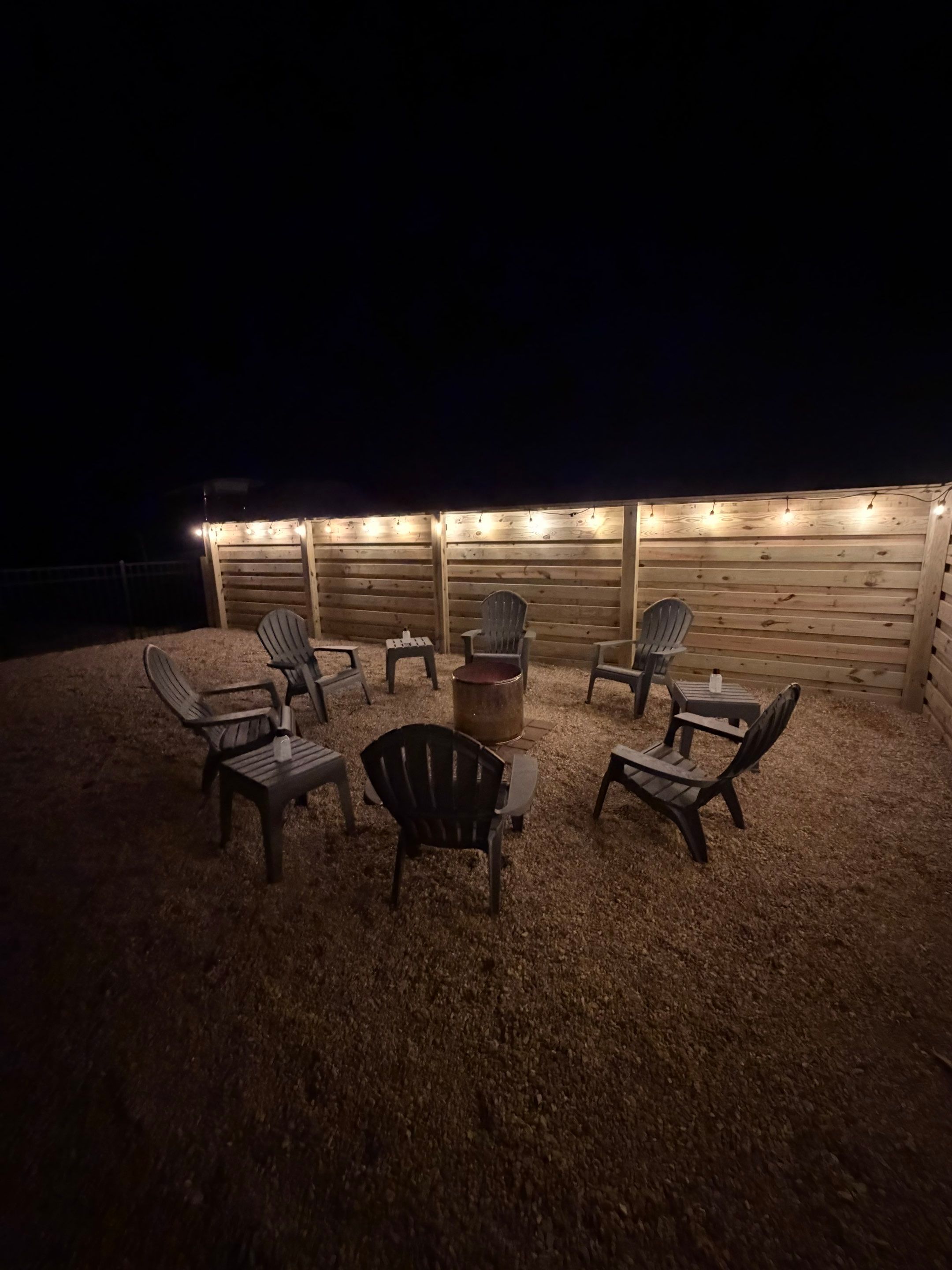 Modern Horizontal Wood Privacy Fence and Backyard Patio in Greenville by Superior Fence and Rail