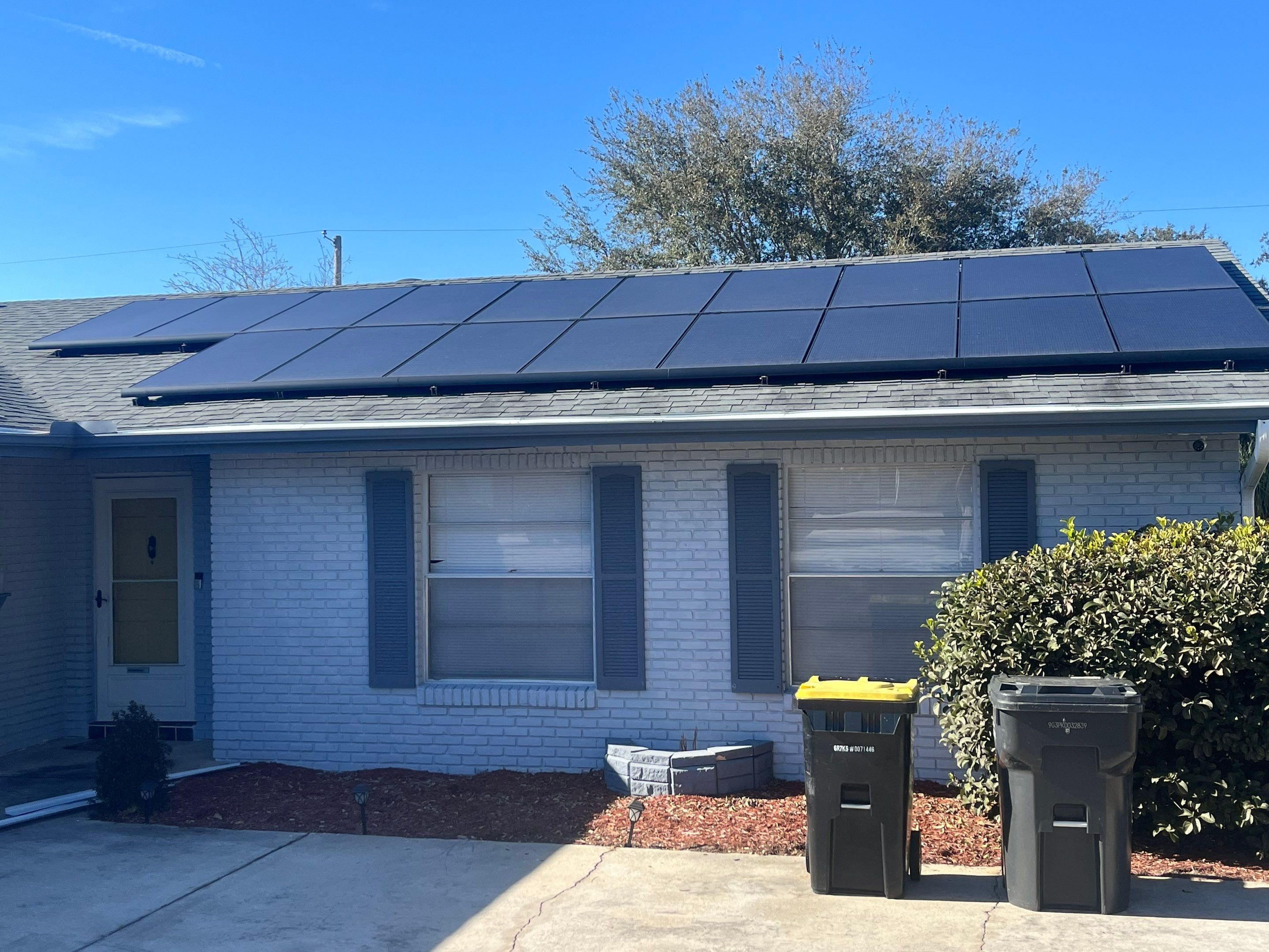 Downspout Installation using Downspout Extension and new Gutters in Winter Haven FL by Gutter Professors