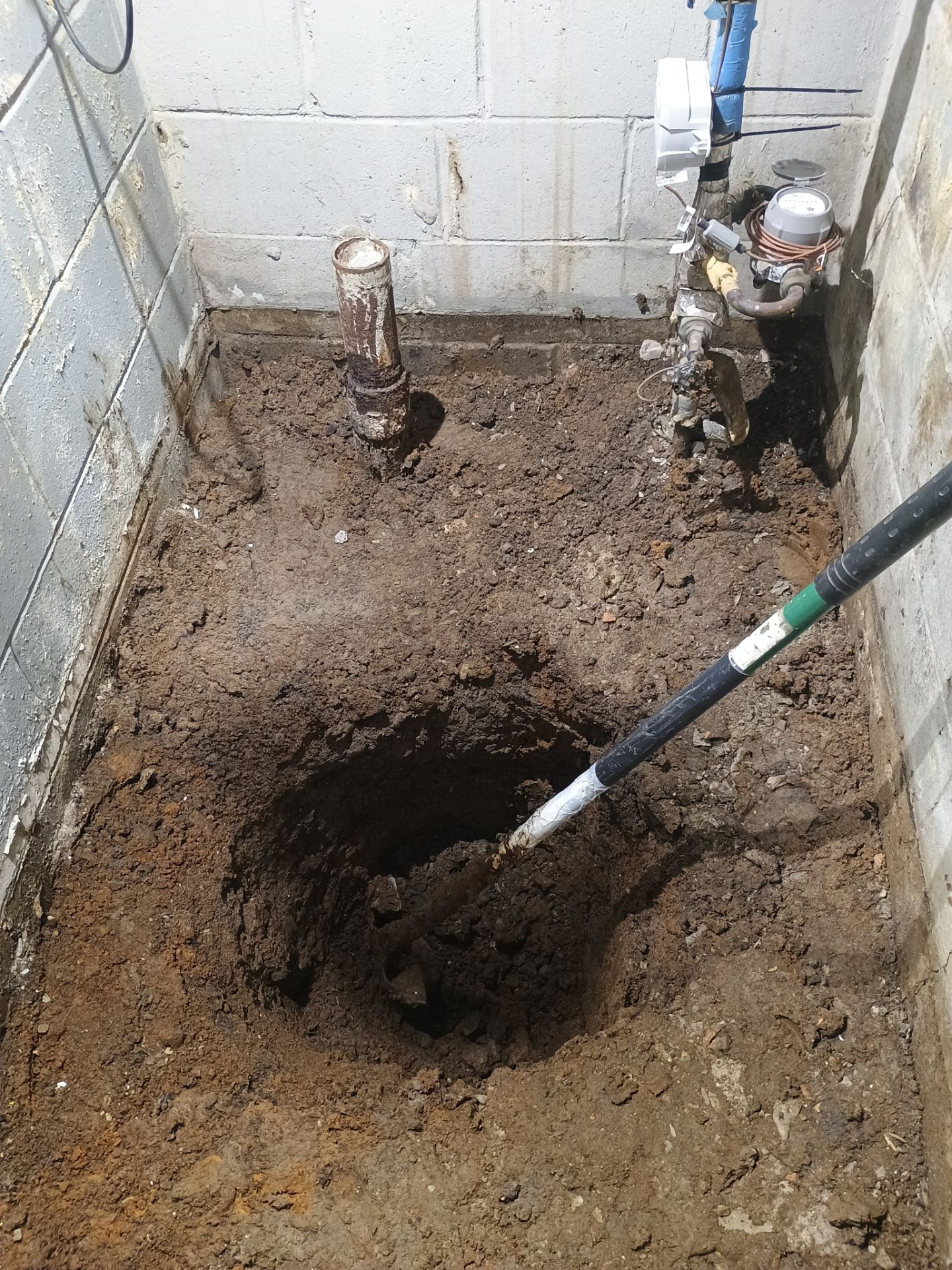 Interior Drain Tile & Sump Pump System in West Minneapolis by Waterproofing Northeast