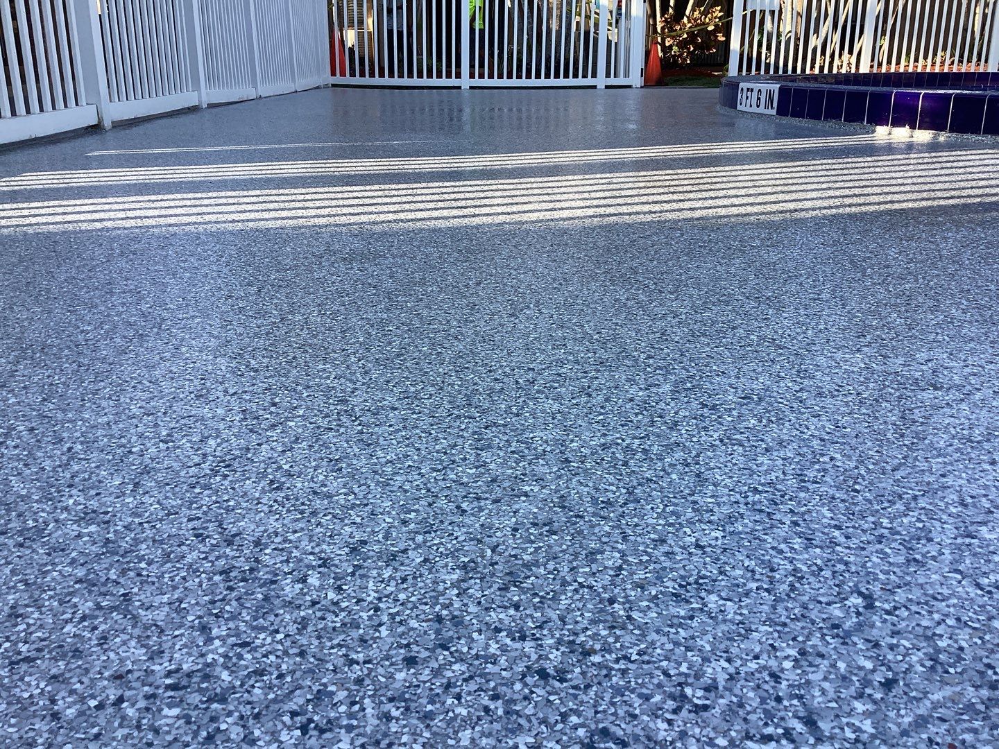 Pool Deck using Orbit and Tidal Wave by Amvet concrete coatings llc