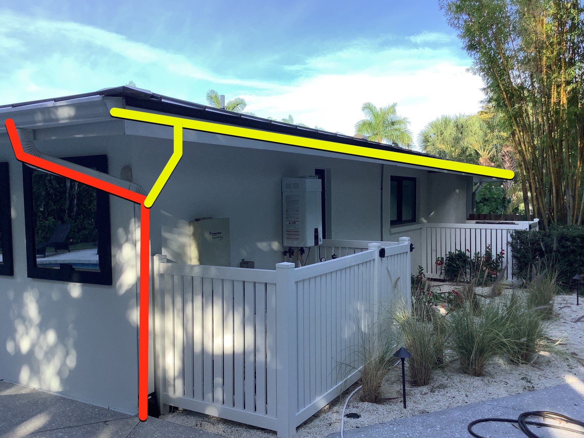White Seamless Gutters and Downspouts in Sarasota FL by Gutter Professors