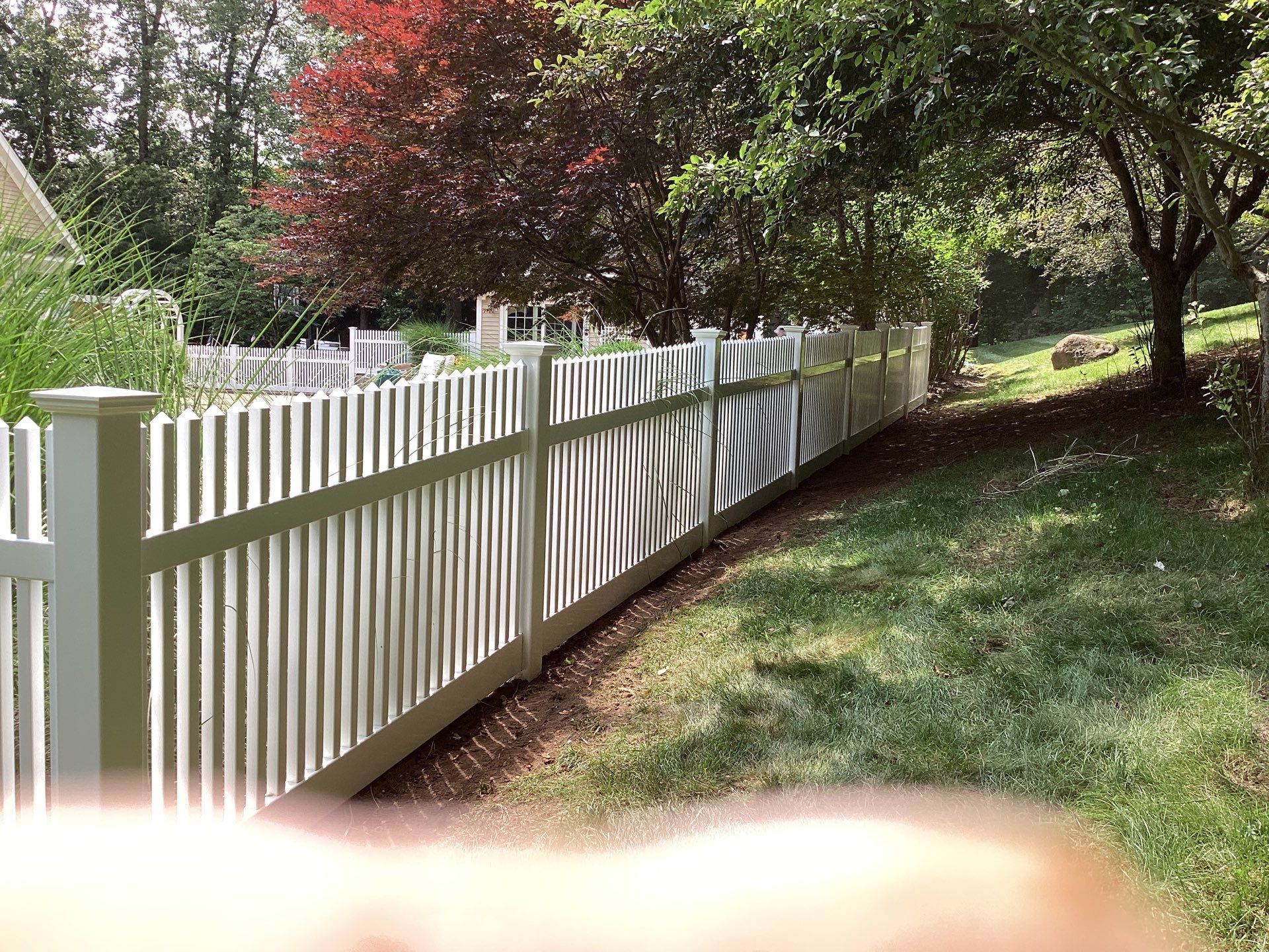 Replacement White Vinyl picket fence and matching gates by DiGiorgi Roofing and Siding Inc