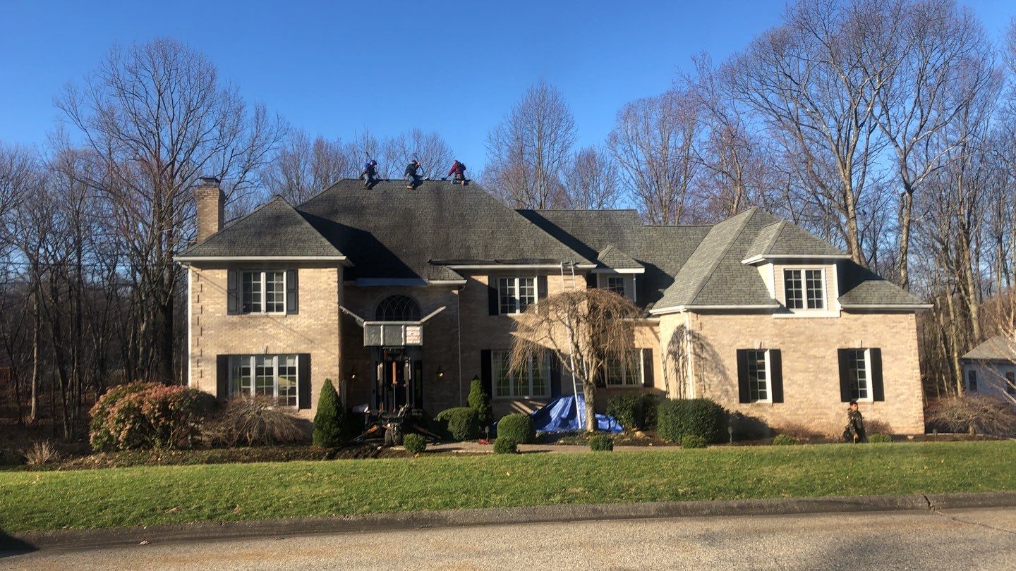 Residential Roofing Installation using Owens Corning TruDefinition Onyx Black by A Plus Exterior