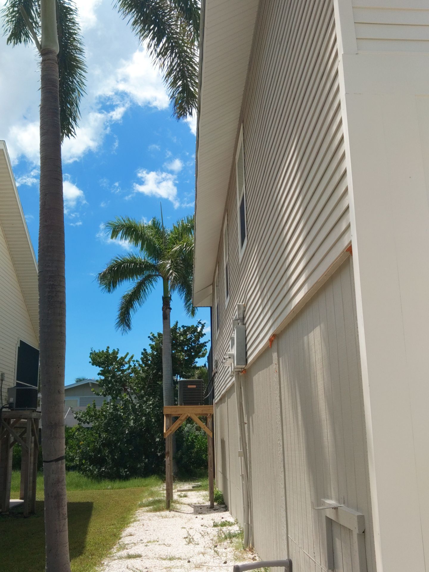 Complete Gutter System with Downspouts & Guards in Fort Myers Beach FL by Gutter Professors