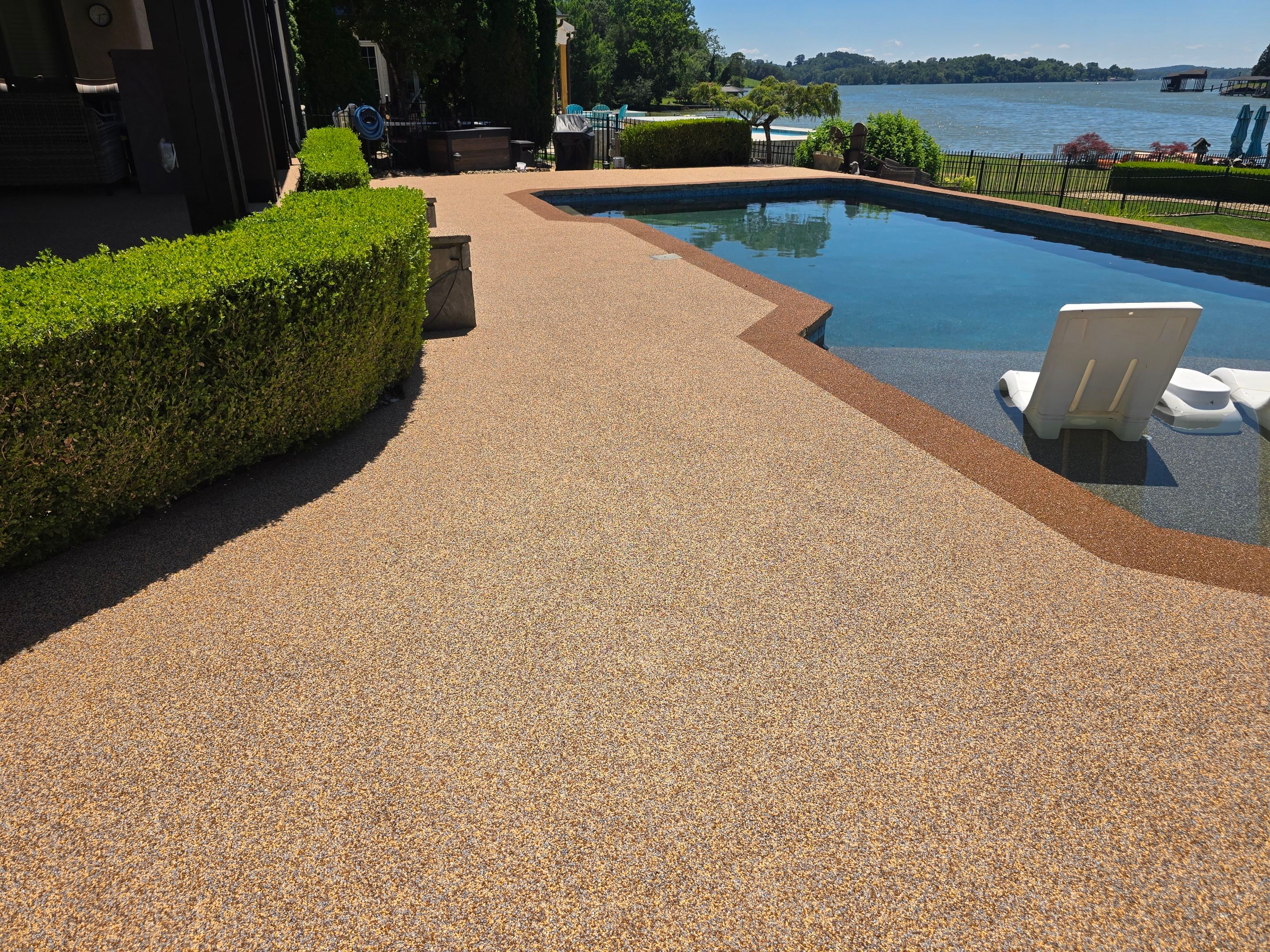 Lakeside Pool Resurface — Sandstone Rubaroc® with Medium Brown Border by Elite Floor Solutions