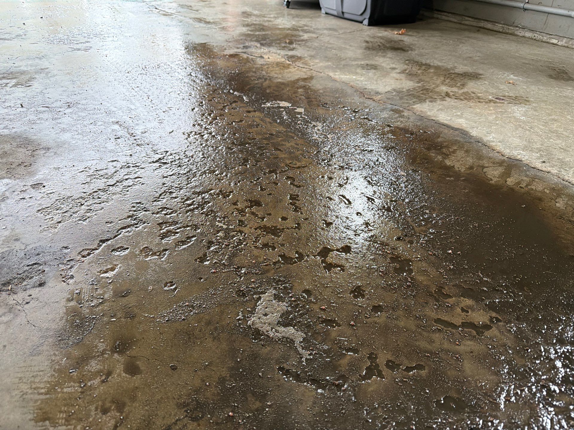 Garage Floor Concrete Coating and Crack Repair in Sioux Falls by Select Painting, Coatings & Garage Cabinets