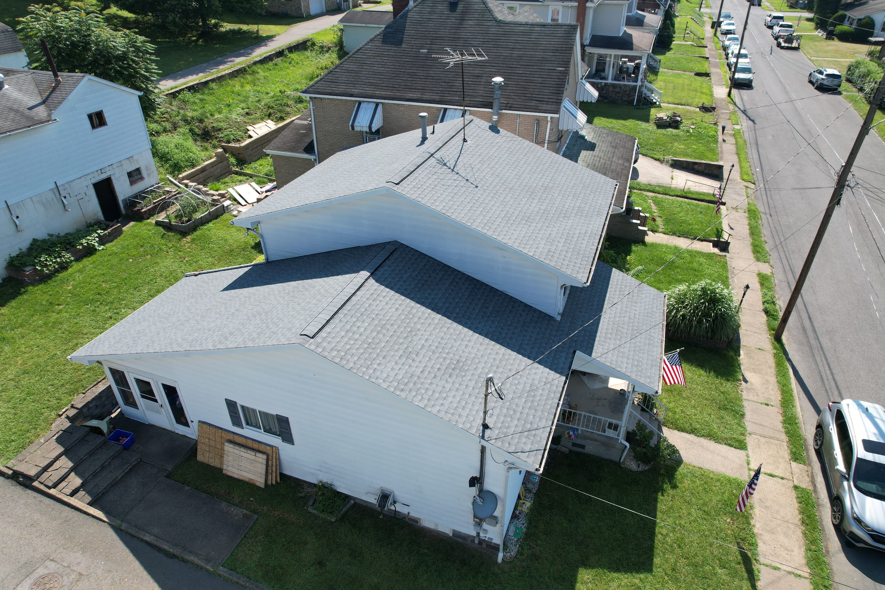 Residential Roofing Installation using GAF Timberline HDZ Oyster Grey by Rainstoppers Roofing
