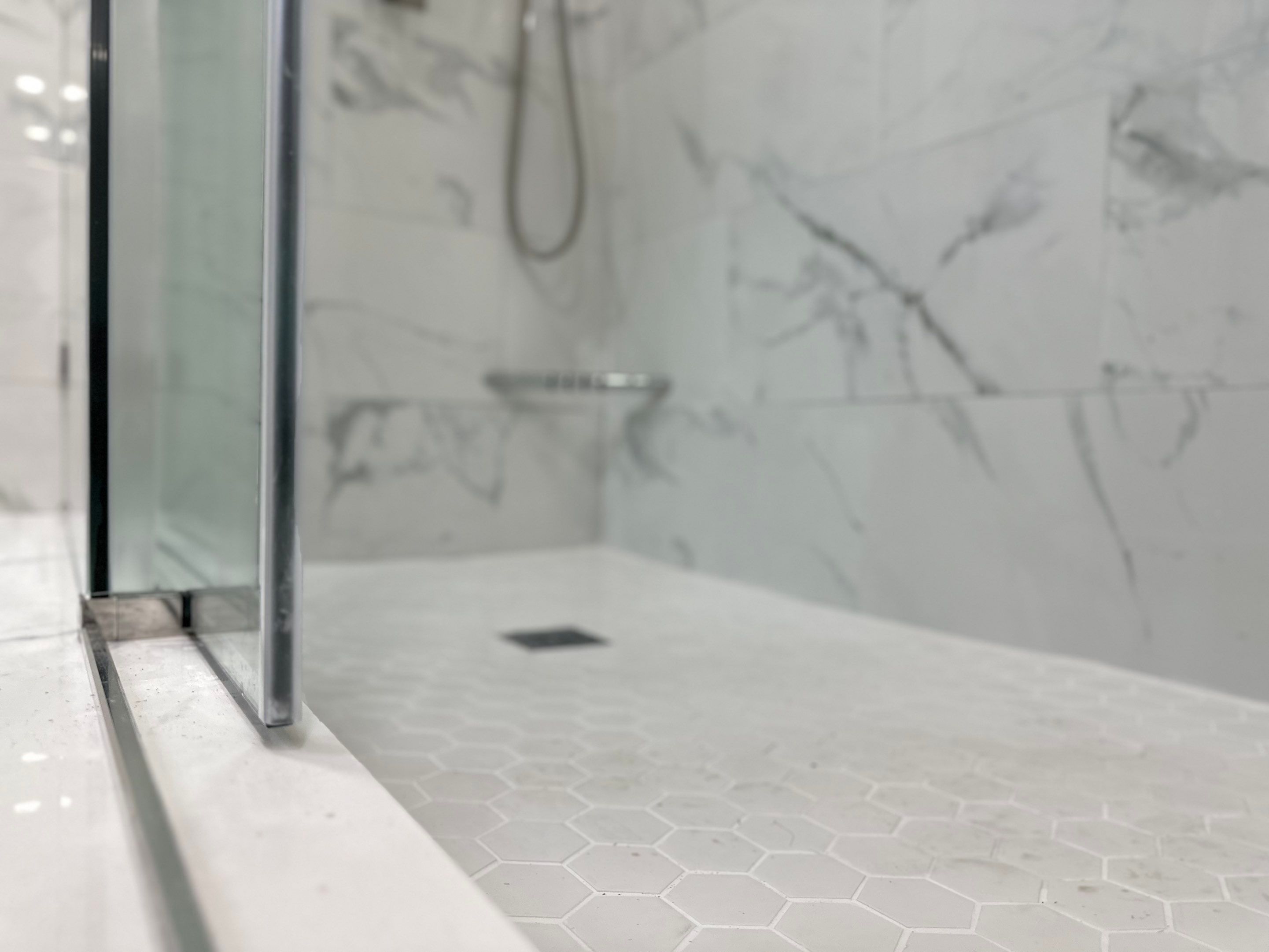 Bathroom Remodel using Tile by Home Concepts Construction