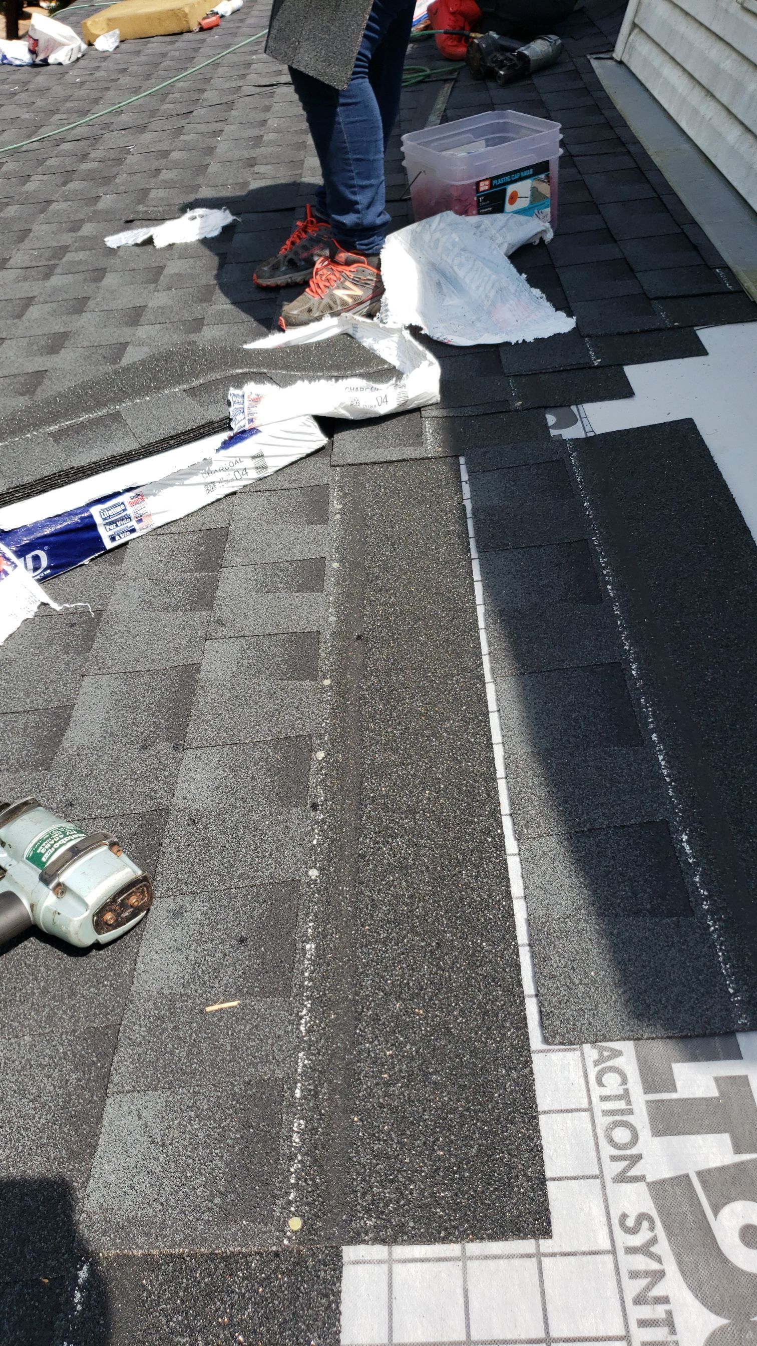 Residential Roofing Installation using Roof Replacement by American Roofing & Construction LLC