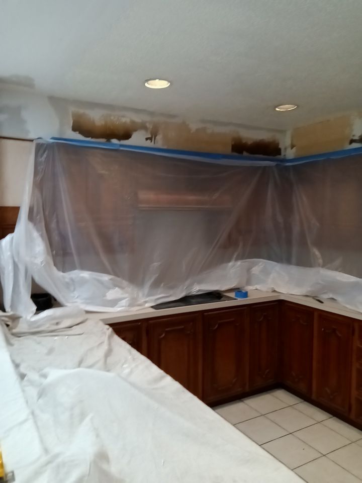 Interior and exterior painting project by Roof Concepts Construction