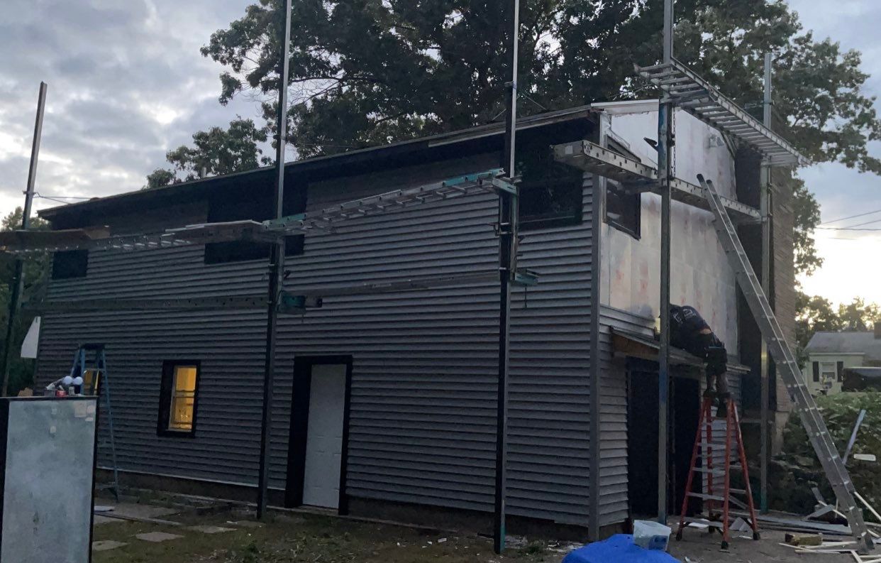 Siding Installation using Certainteed monogram charcoal gray Owens Corning Onyx Black by A Plus Exterior